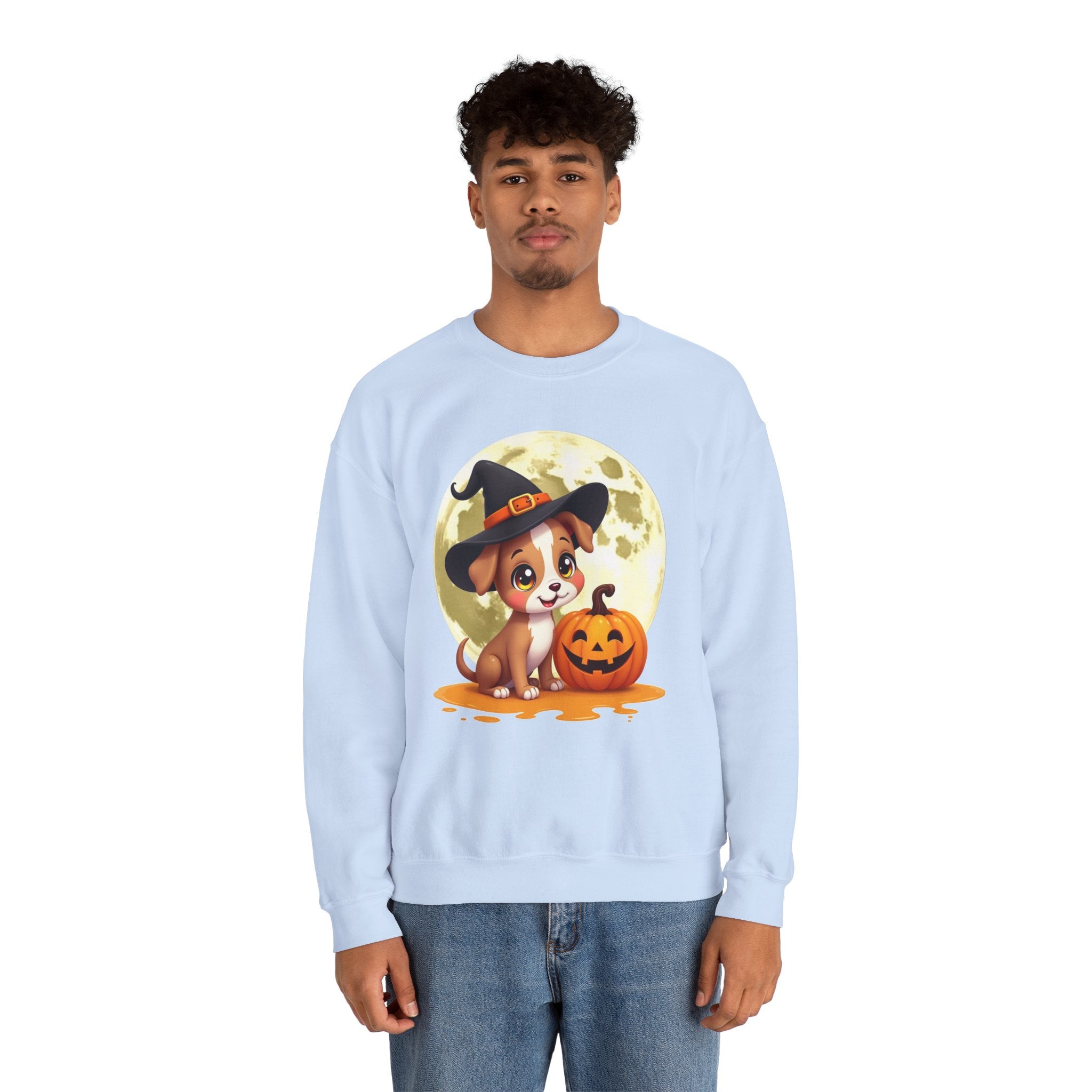 Person wearing a light blue sweatshirt with a Halloween-themed design featuring a dog and pumpkin.