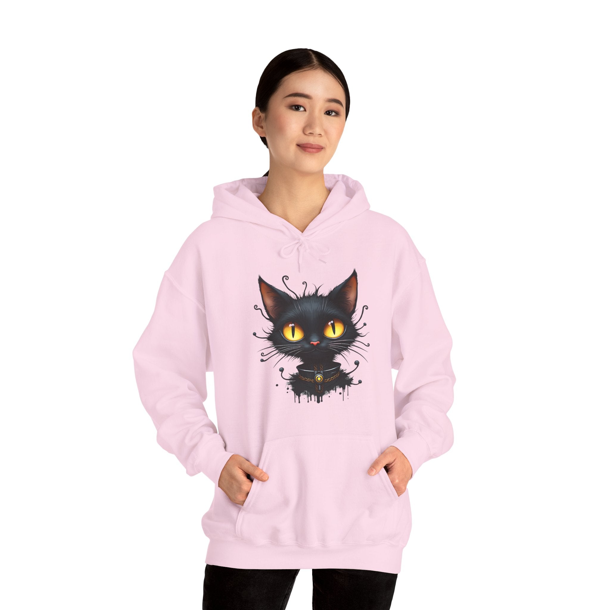 Person wearing a pink hoodie with a black cat graphic on a white background