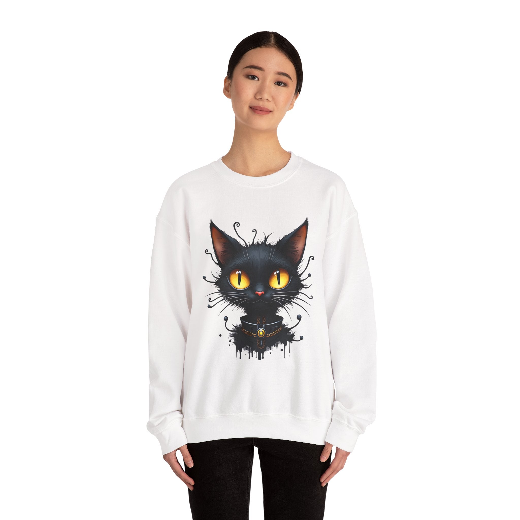 White sweatshirt with a black cat graphic worn by a model on a white background