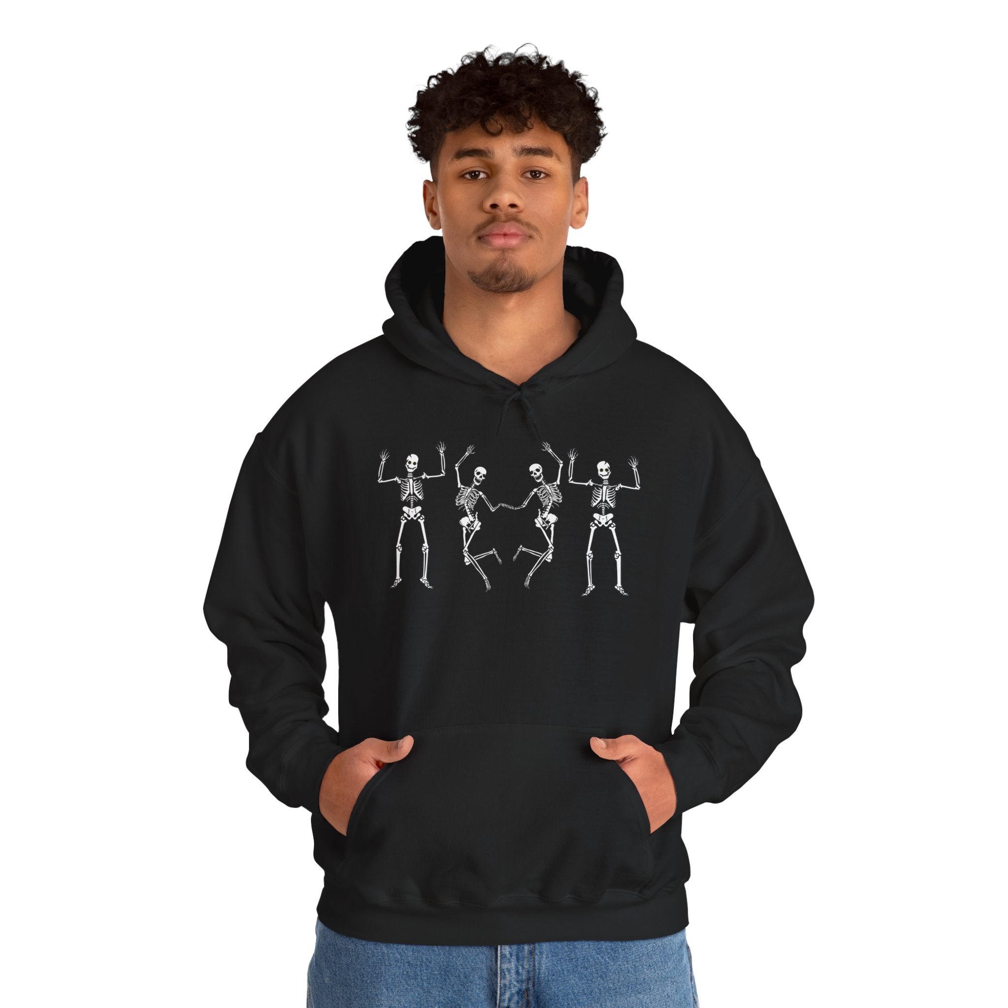 Person wearing a black hoodie with skeleton designs on a white background