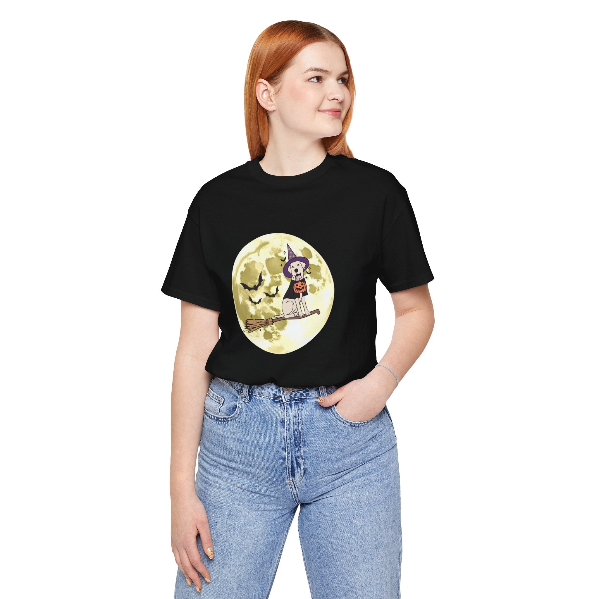 Person wearing a black t-shirt with a graphic design on a white background