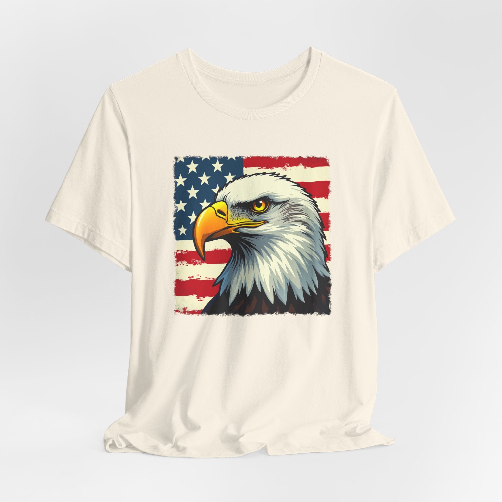 Ivory beige t-shirt with an eagle and American flag design on a light gray background