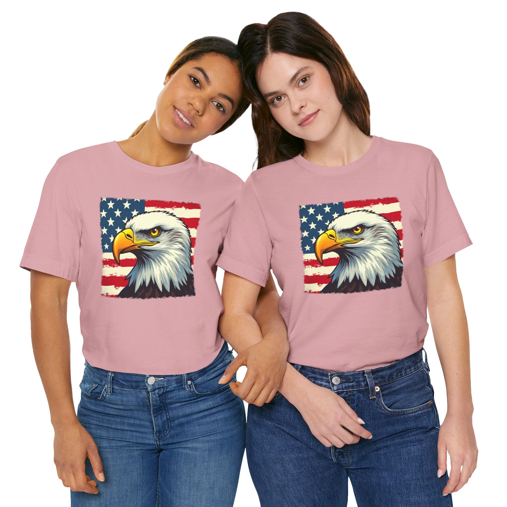 Two people wearing pink t-shirts with an eagle and American flag design on a white background.