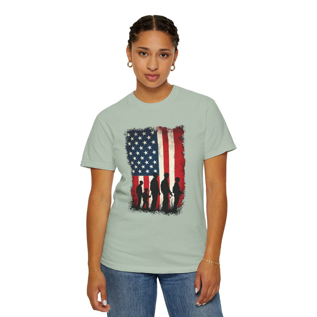 Person wearing a light green t-shirt with an American flag design on a white background