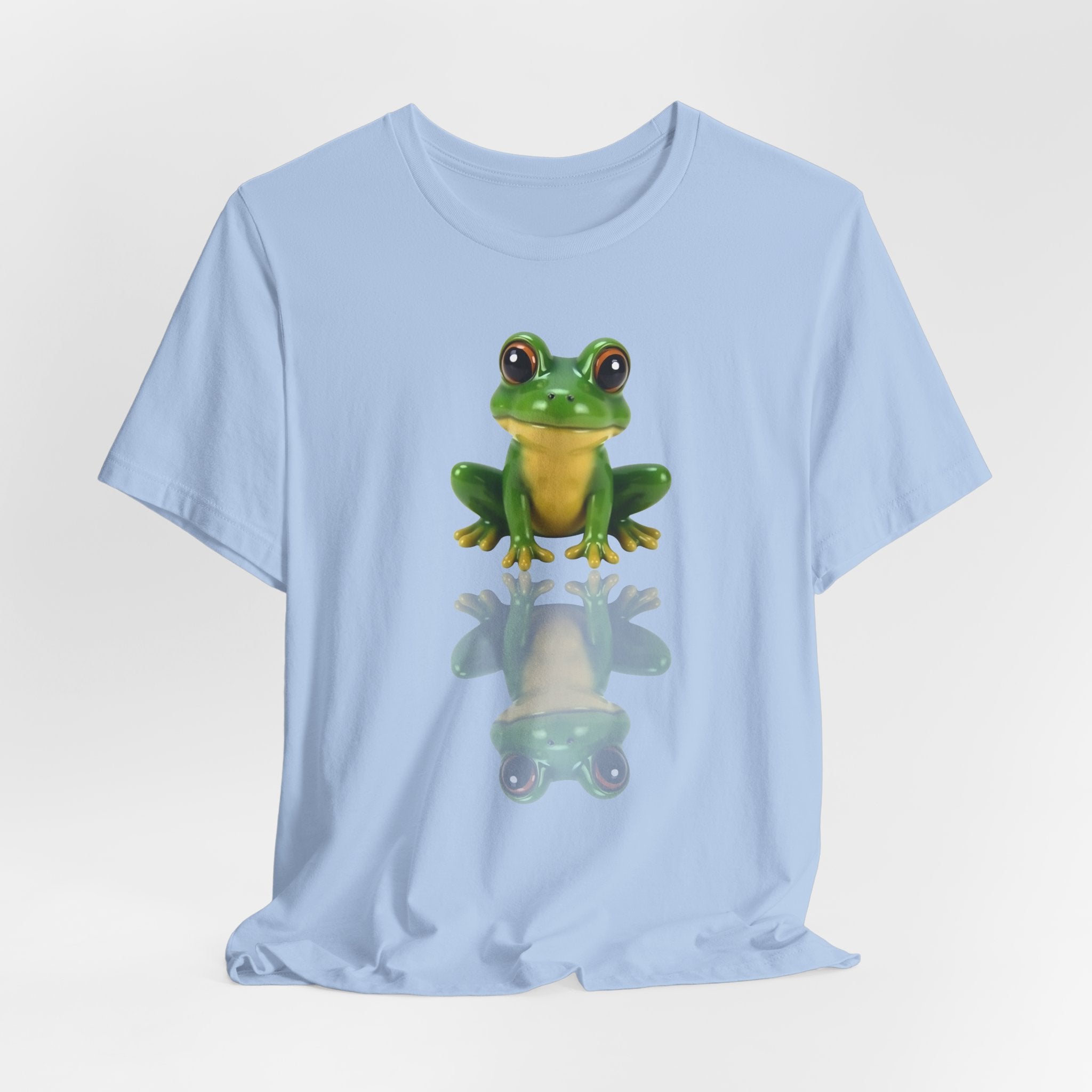 Baby light blue t-shirt with a green frog graphic on a white background