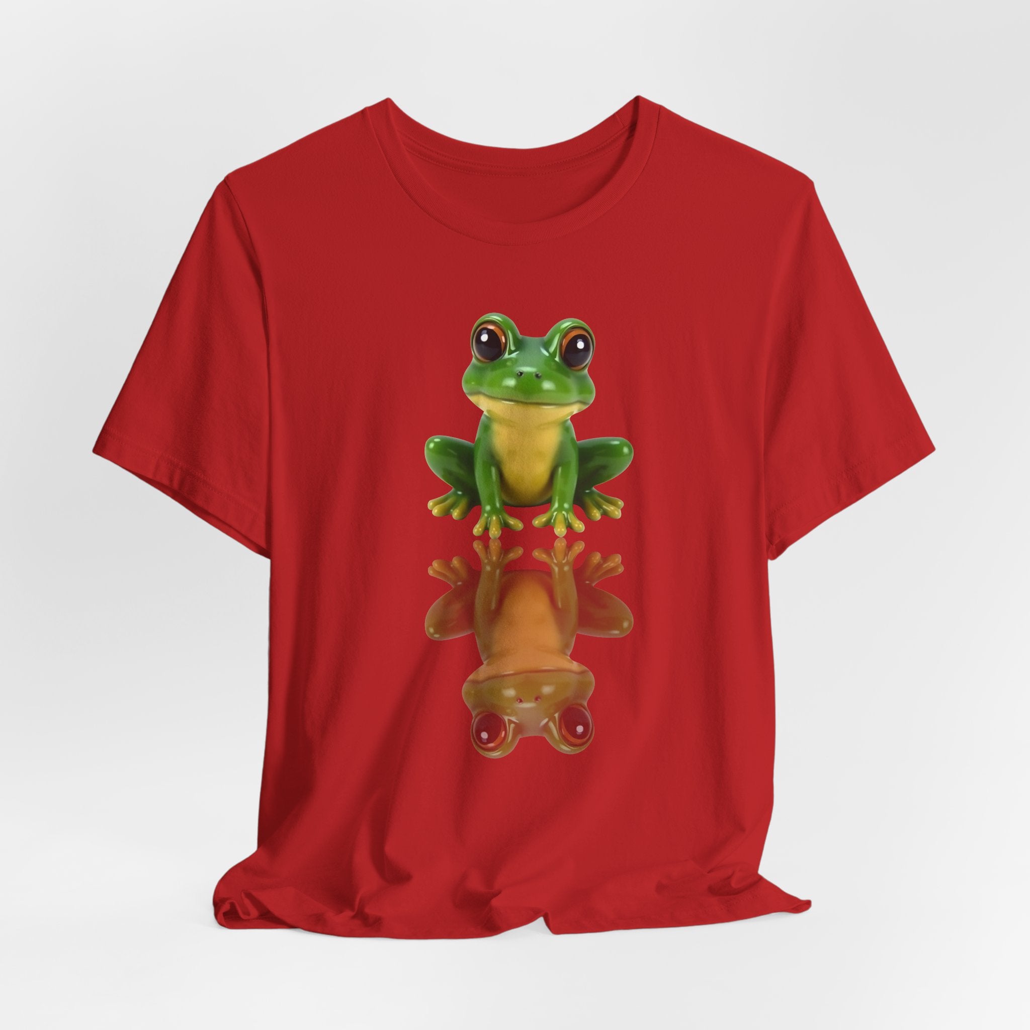 Red t-shirt with a green frog graphic on a white background
