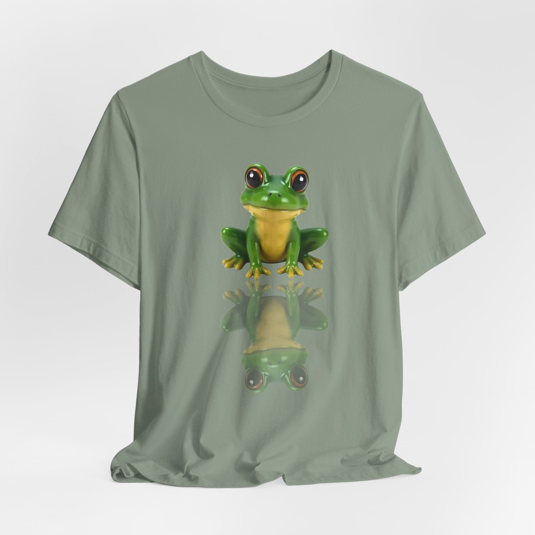 Sage green t-shirt with a frog graphic on a white background