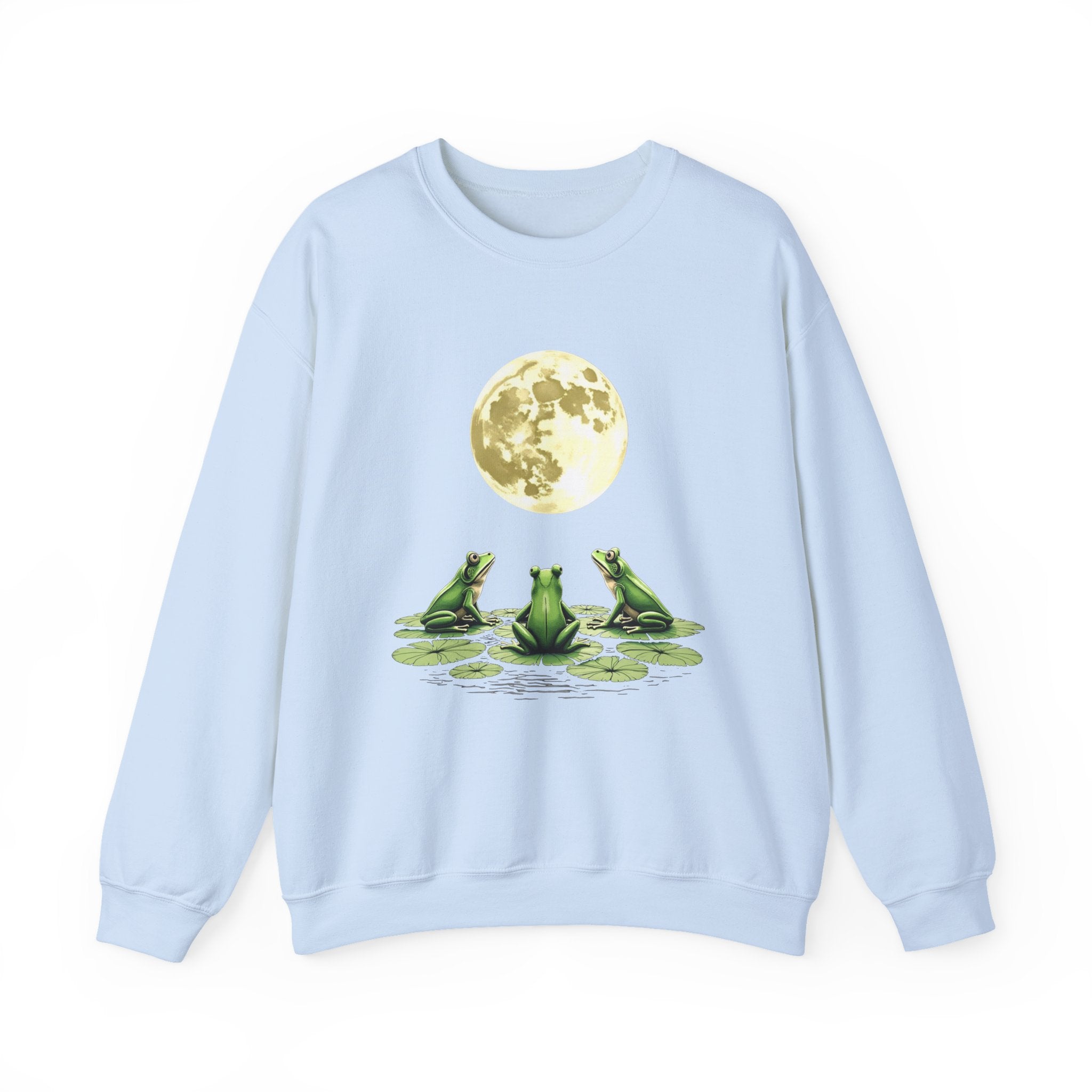 Light blue sweatshirt with a graphic of three frogs and a moon on a white background