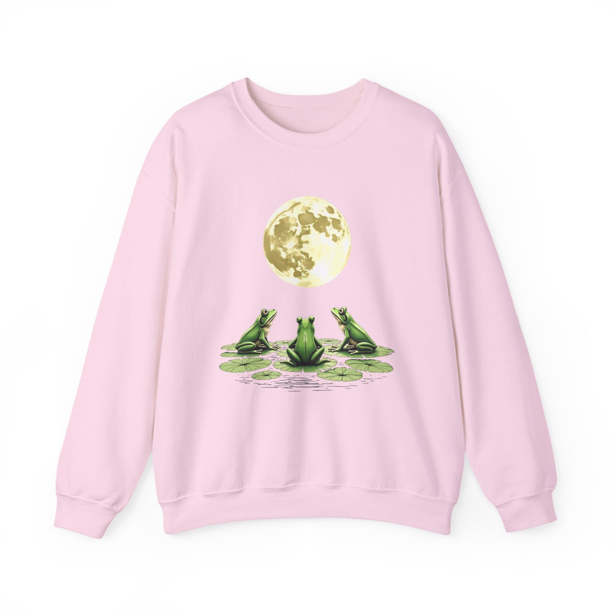 Light pink sweatshirt with frog and moon design on a white background