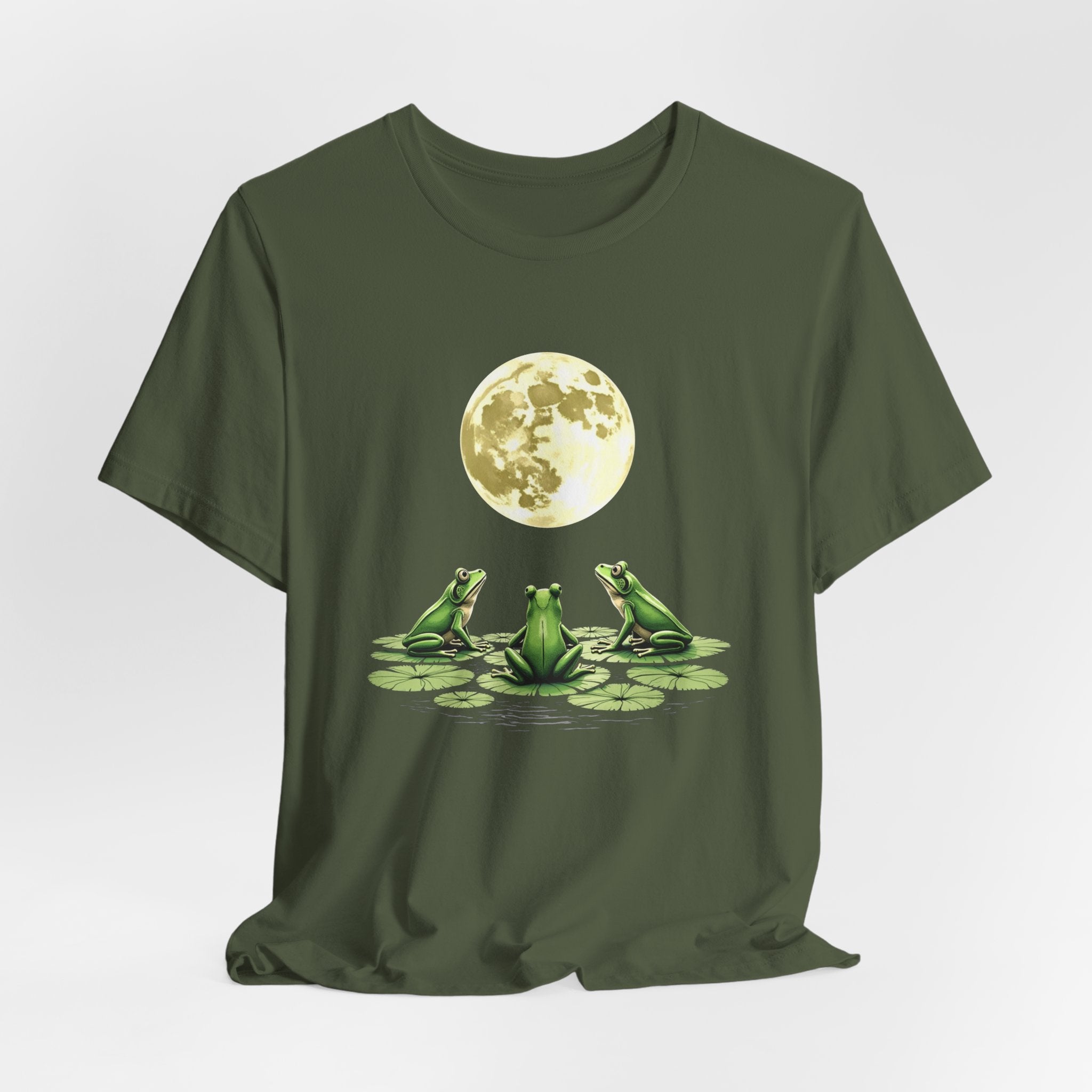 Military green t-shirt featuring cute frogs sitting on top of water lily watching on the moon graphic on a white background