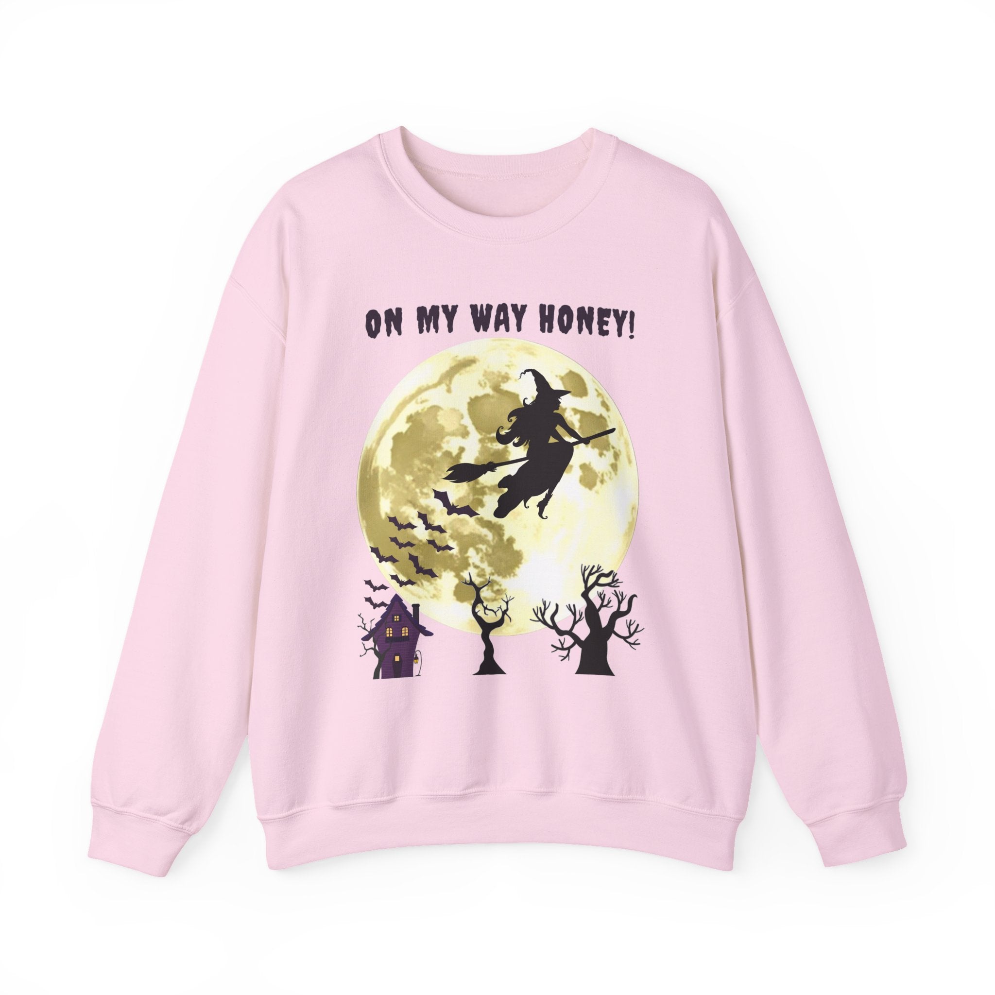Pink sweatshirt with Halloween design featuring a witch and text 'On My Way Honey!' on a white background.