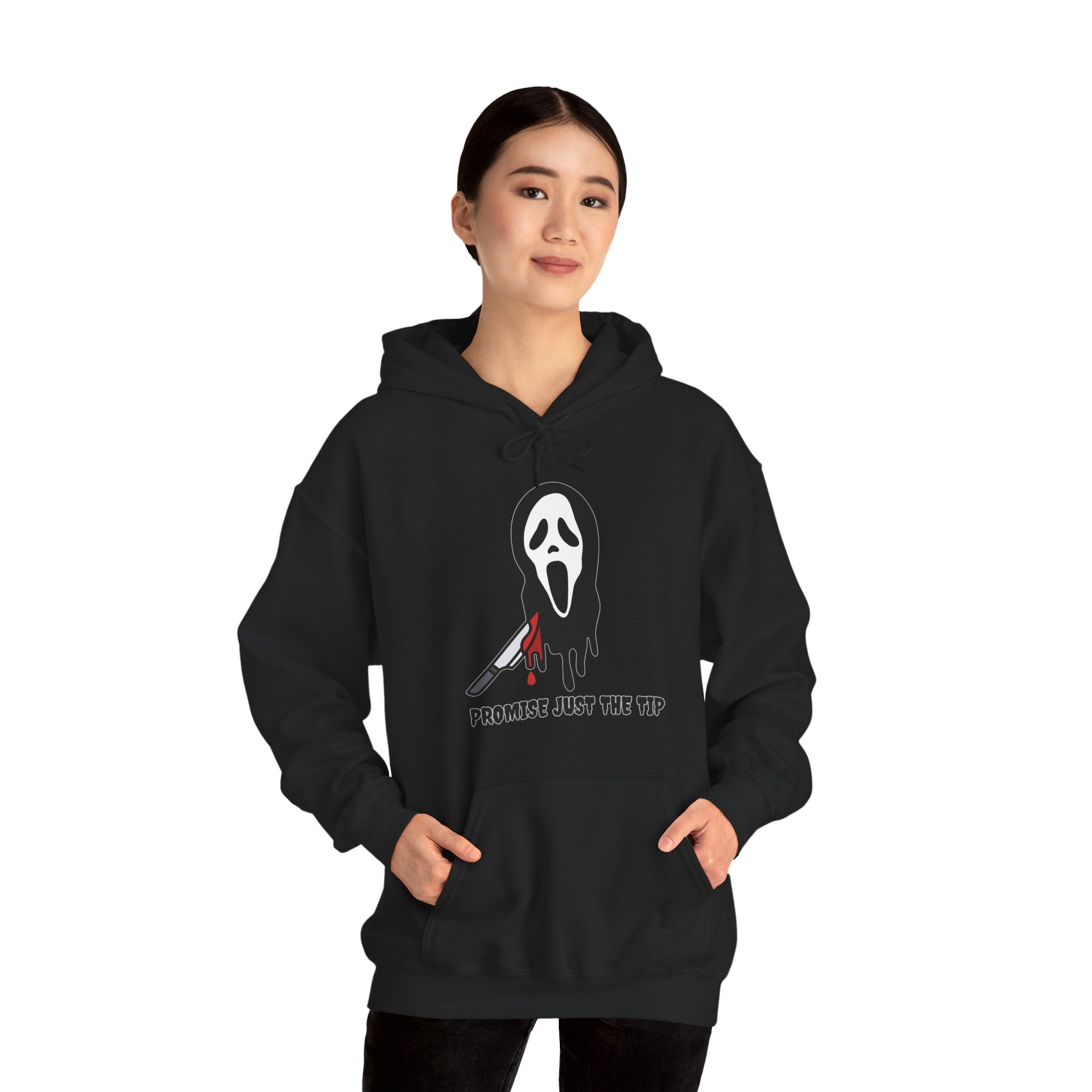 Person wearing a black hoodie with a graphic design on a white background