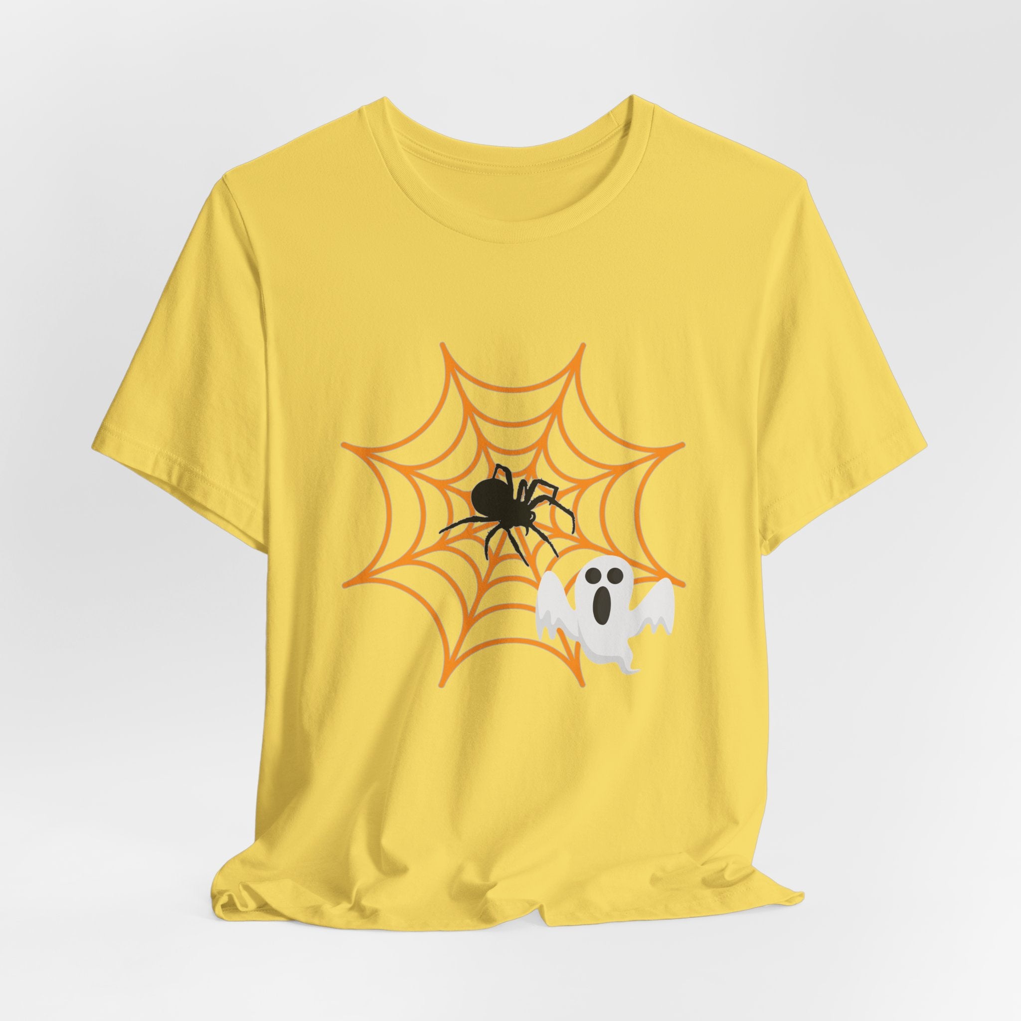Maze yellow t-shirt with Halloween design of a spider, web, and ghost on a white background