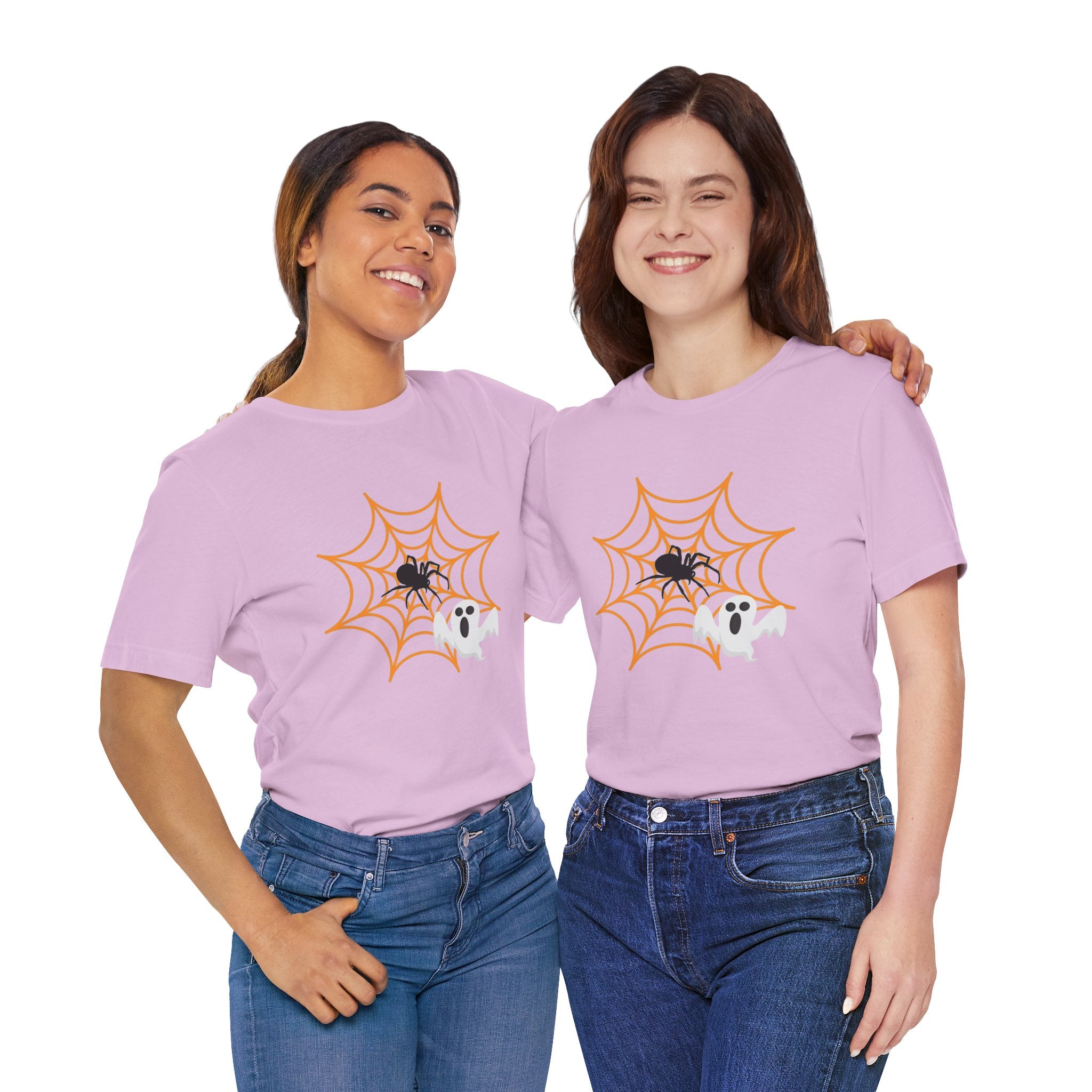 Two people wearing matching purple t-shirts with spider and ghost designs on a white background