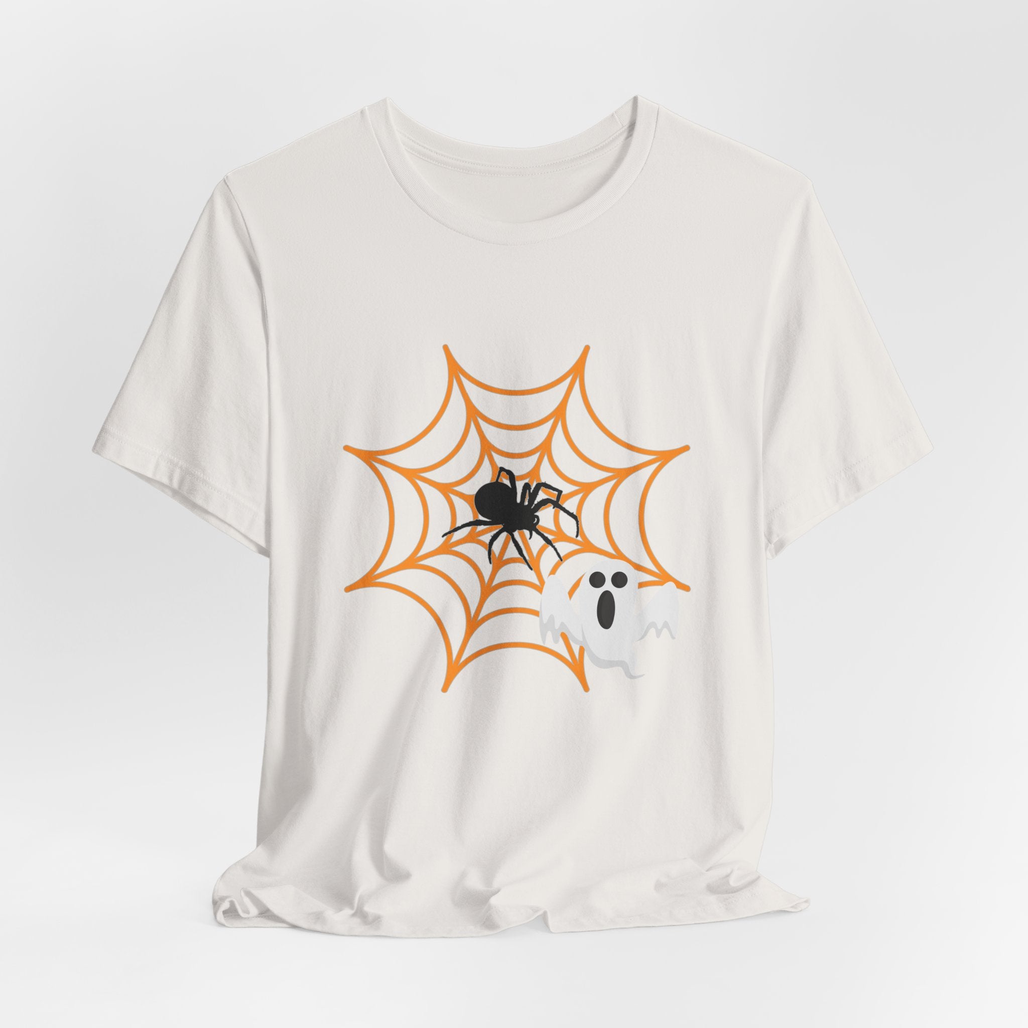 Vintage white t-shirt with Halloween design featuring a spider, web, and ghost on a white background