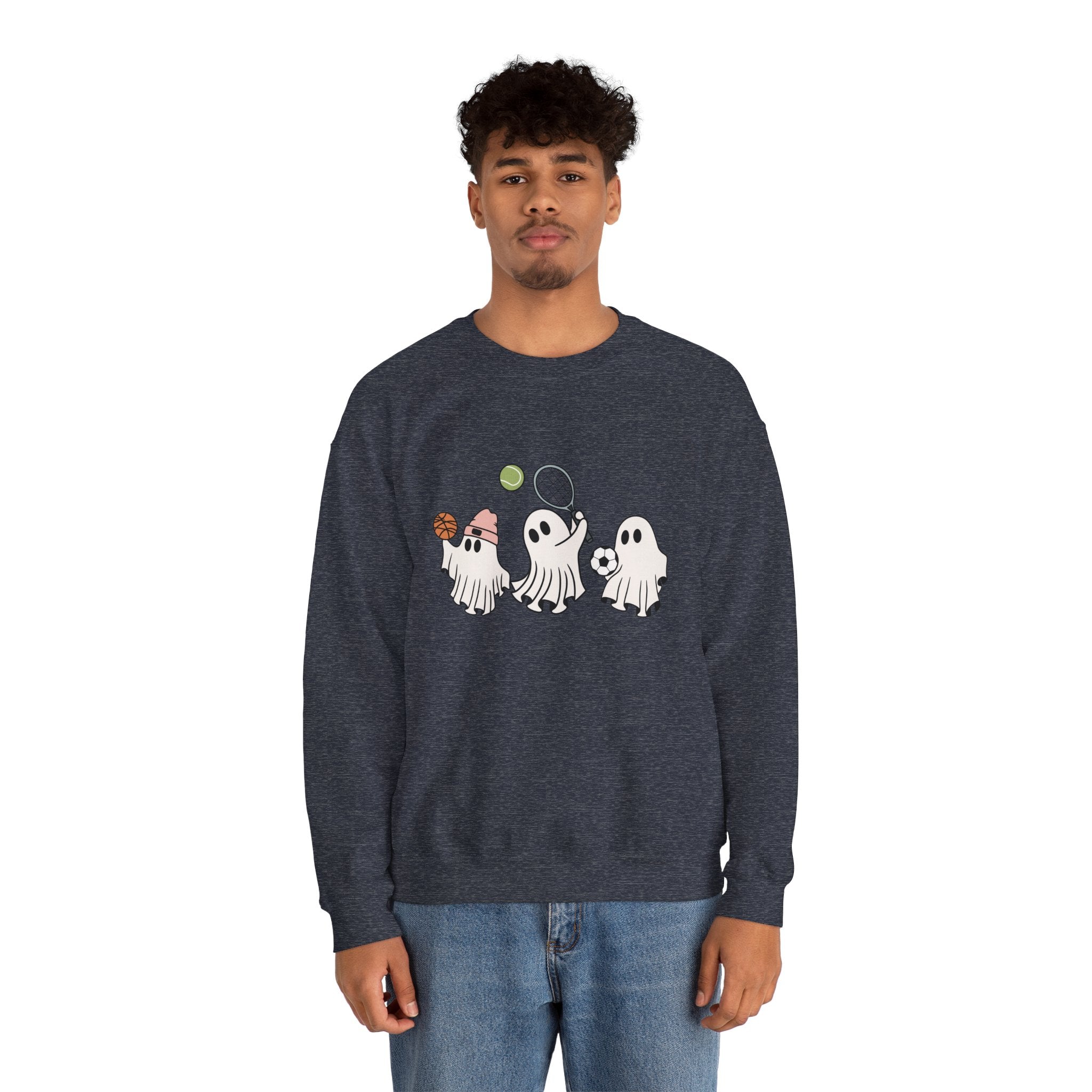 Person wearing a dark blue sweatshirt with ghost graphics on a white background