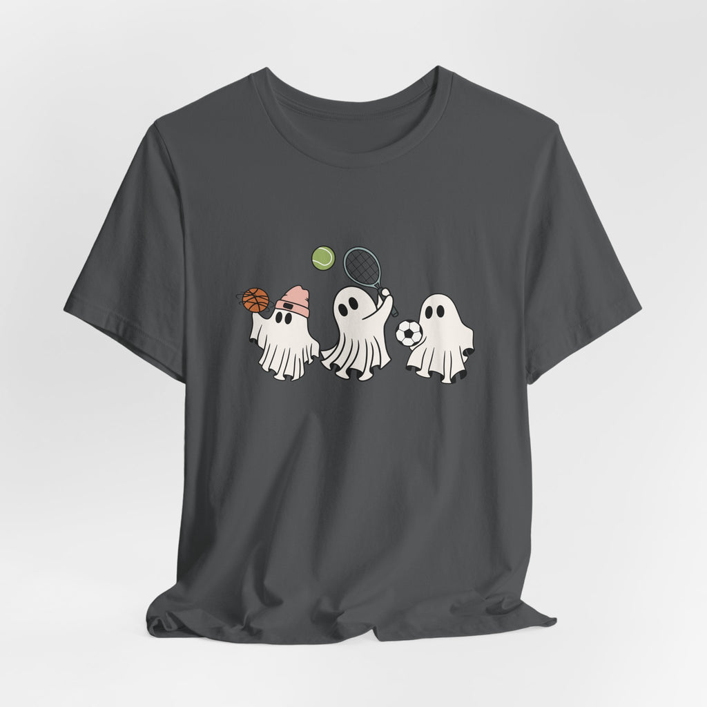 Asphalt gray t-shirt with cartoon halloween ghosts playing basketball, tennis, and football on a white background