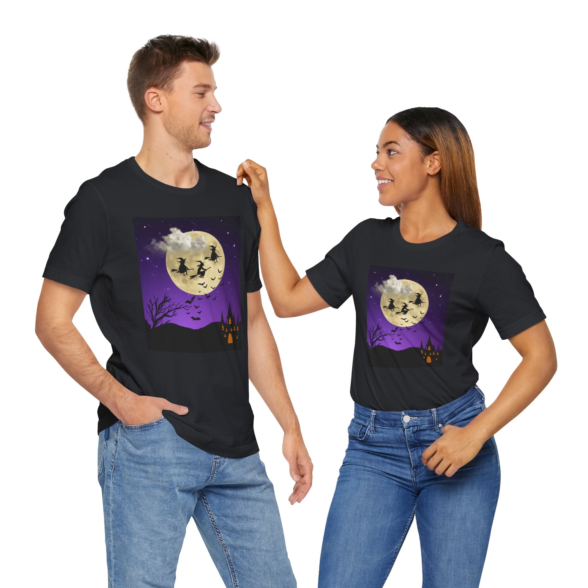 Two people wearing black t-shirts with a Halloween design on a white background