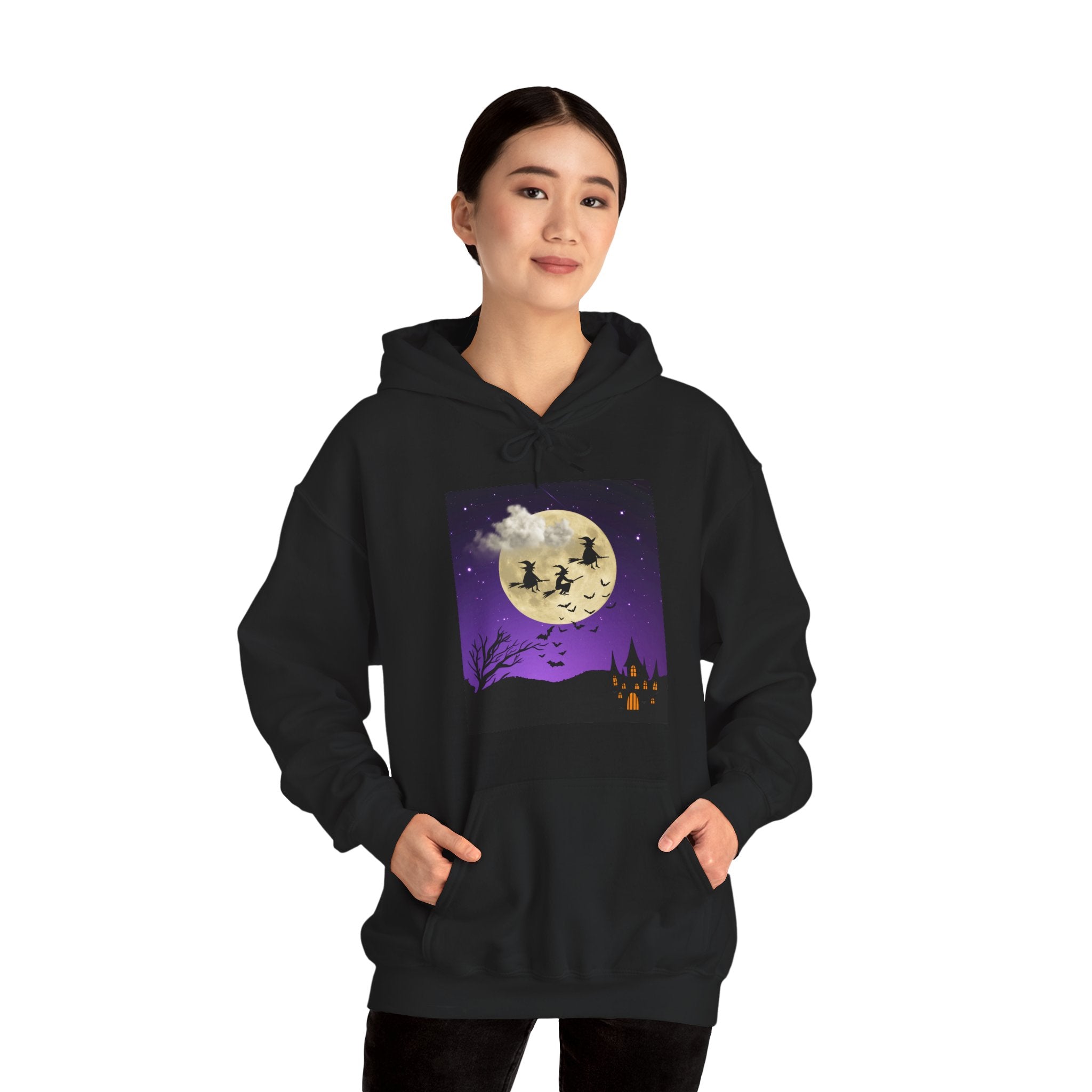 Person wearing a black hoodie with a Halloween-themed design on a white background