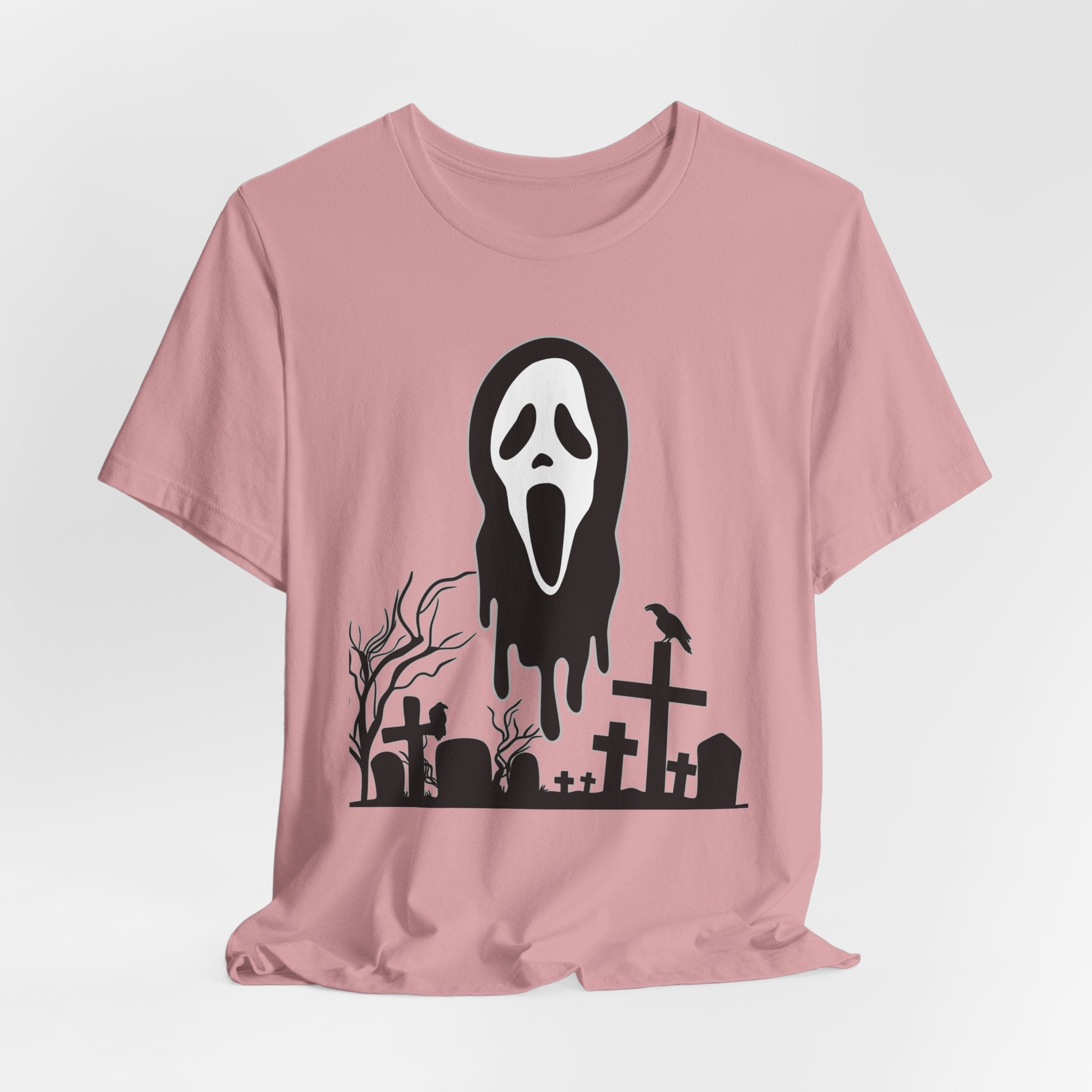 Orchid pink t-shirt with a black graphic of a ghost face and graveyard on a white background