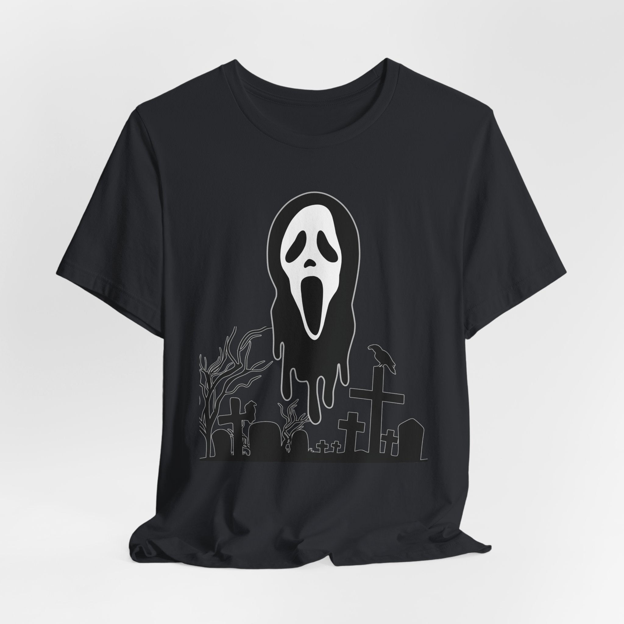 Vintage black t-shirt with white ghost face design on a light gray background