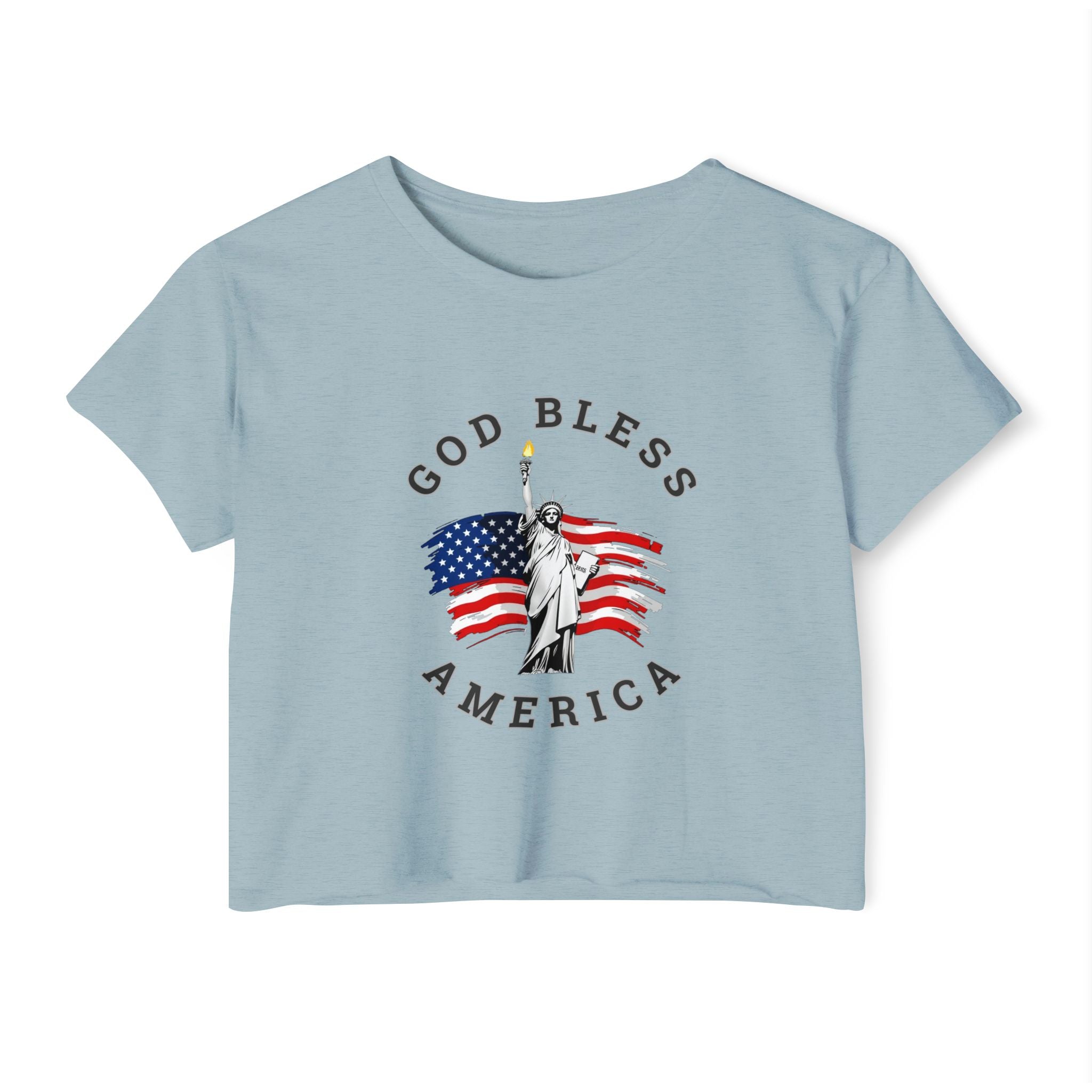 Stonewash denim t-shirt with 'God Bless America' graphic featuring the Statue of Liberty and American flag on a white background.