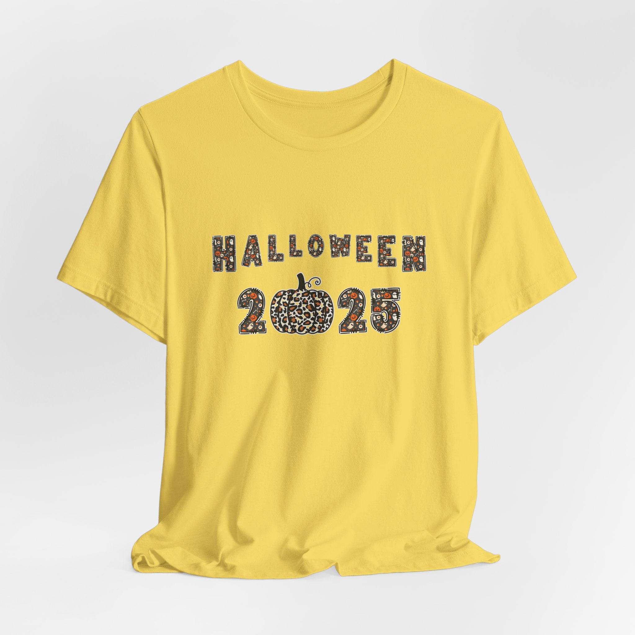 Maze yellow t-shirt with 'Halloween 2025' design and spooky themes on a white background