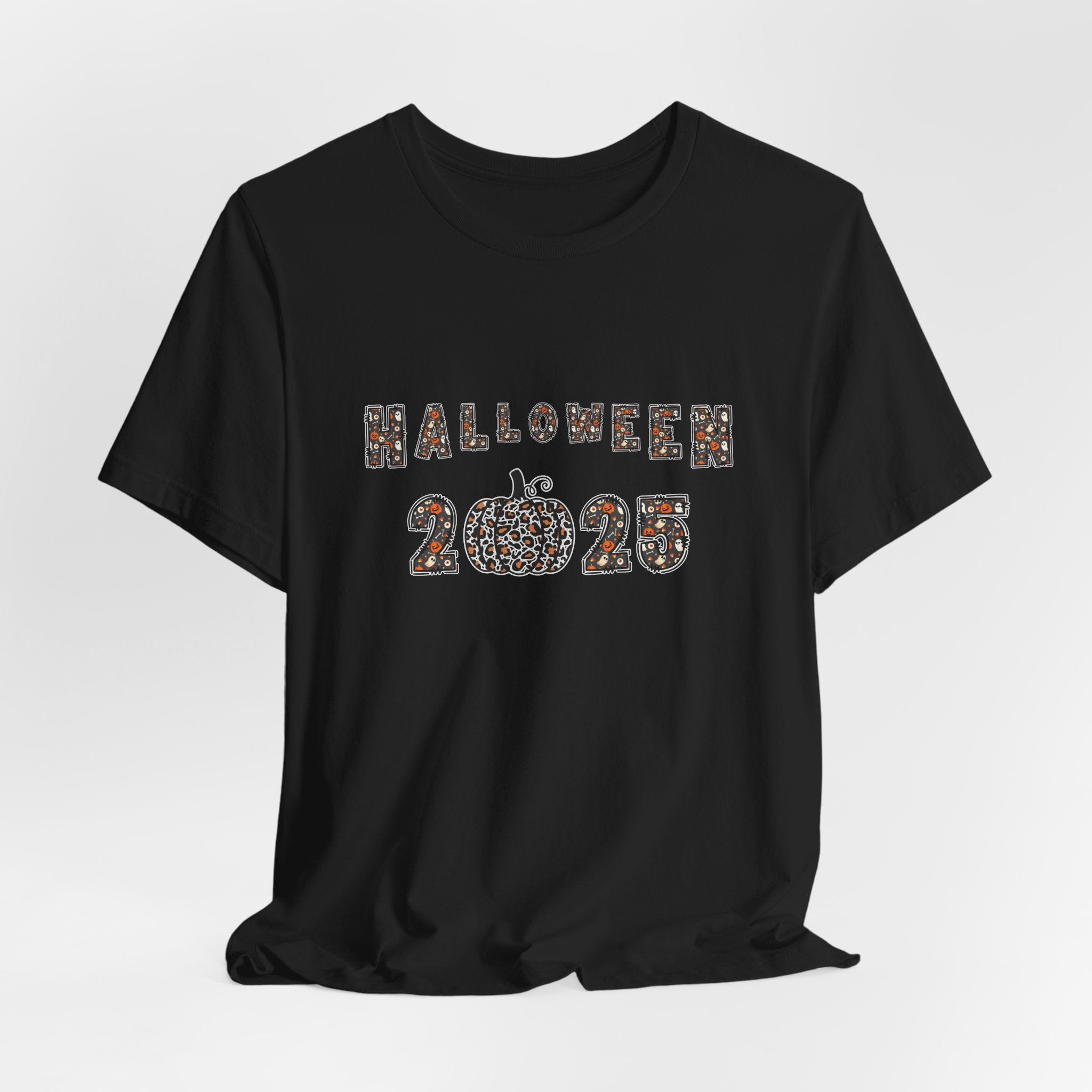 Vintage black t-shirt with 'Halloween 2025' design and spooky themes on a white background
