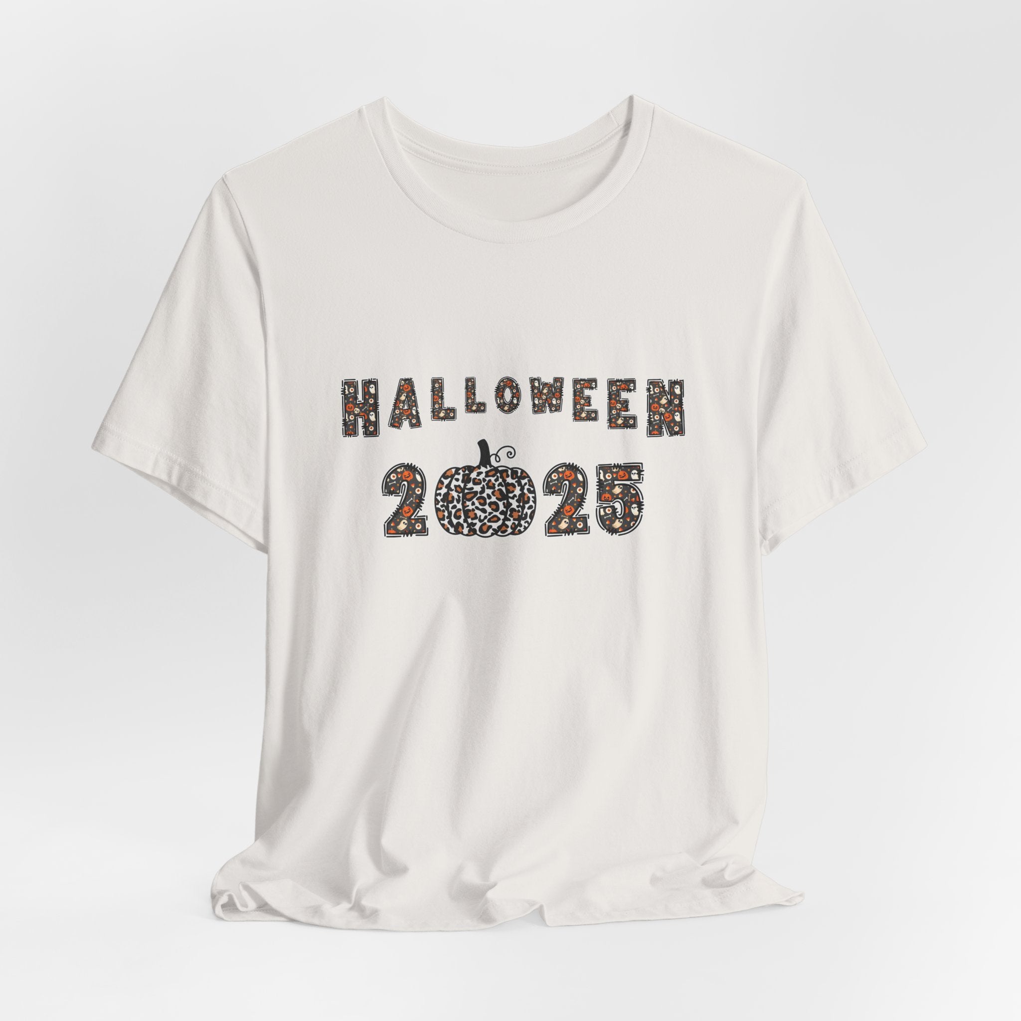 Vintage white t-shirt with 'Halloween 2025' design and spooky themes on a white background