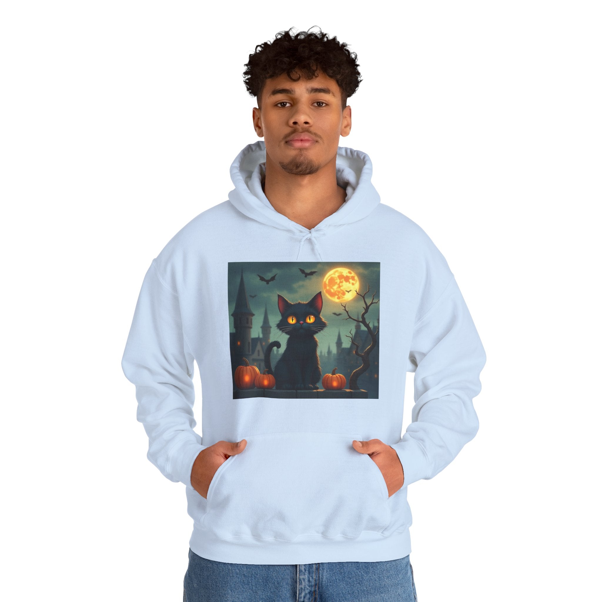Person wearing a light blue hoodie with a Halloween-themed design featuring a black cat, full moon, and pumpkins.