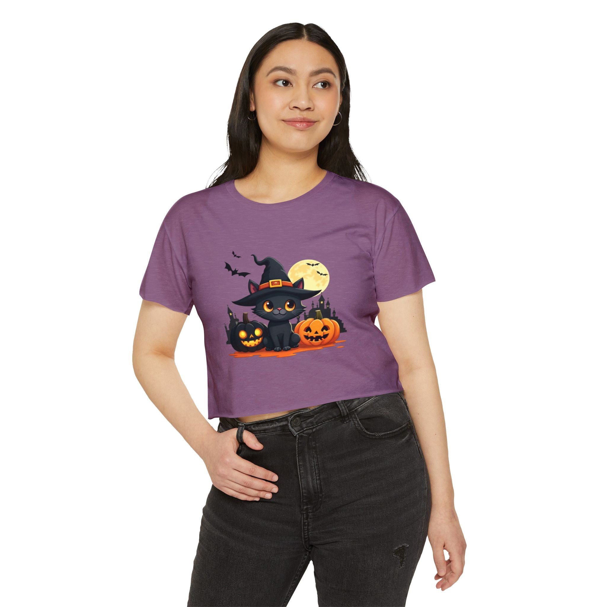 Person wearing a purple t-shirt with Halloween-themed design on a white background