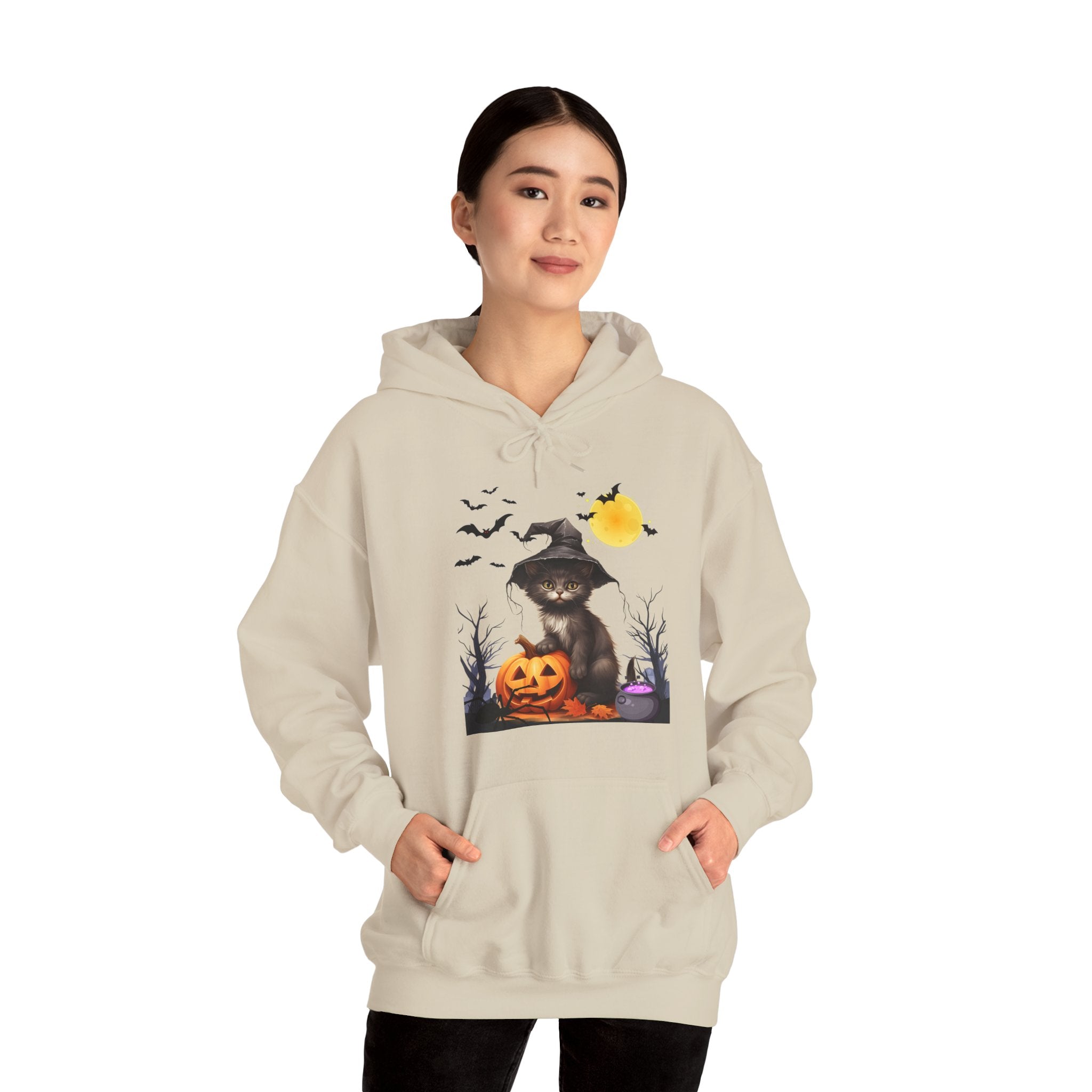 Person wearing a beige hoodie with a Halloween-themed design on a white background