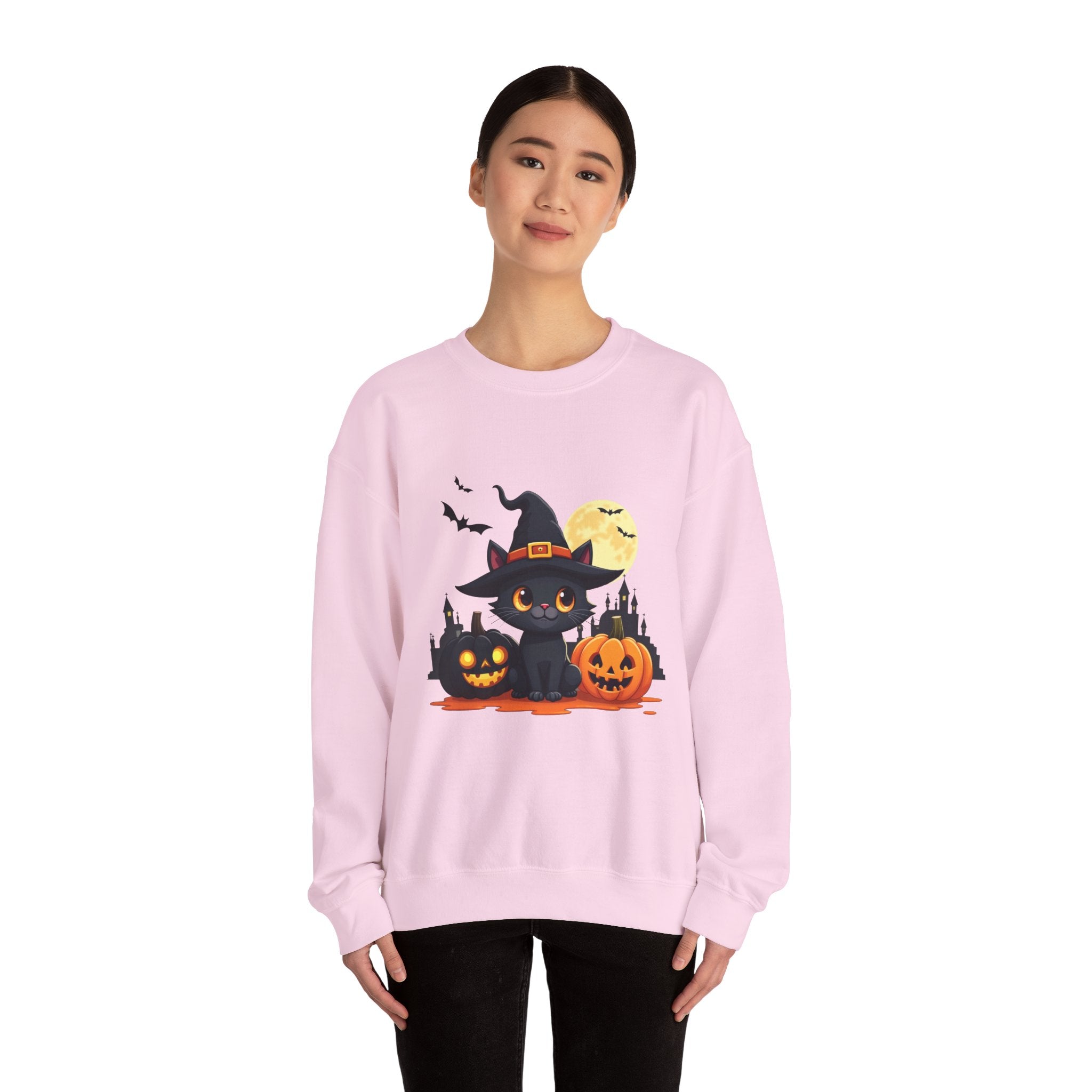 Person wearing a pink sweatshirt with Halloween-themed design on a white background