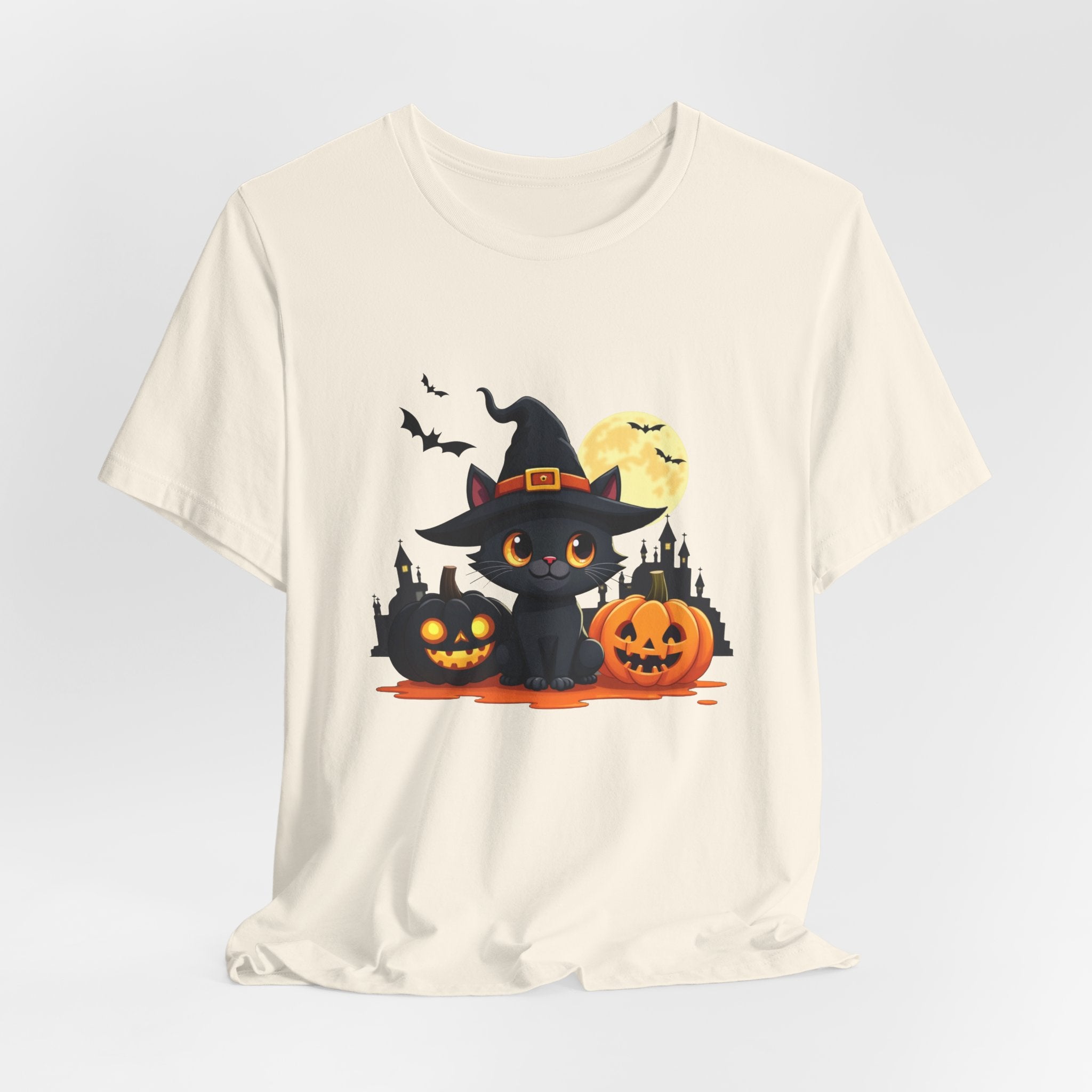 Natural beige t-shirt with a Halloween-themed design featuring a black cat, pumpkins, and bats on a light gray background.