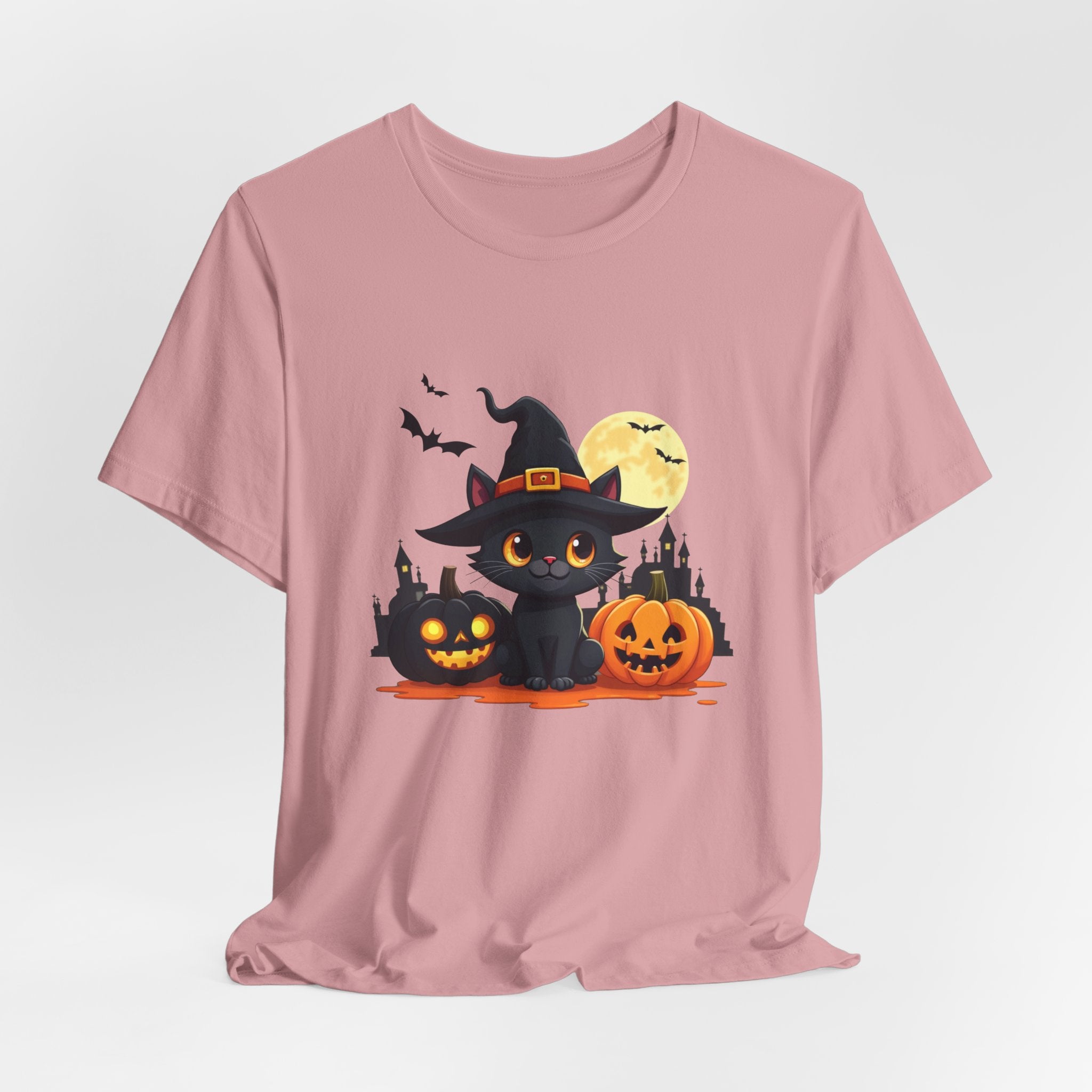 Orchid pink t-shirt with Halloween-themed design featuring a black cat in a witch hat and pumpkins on a light gray background.