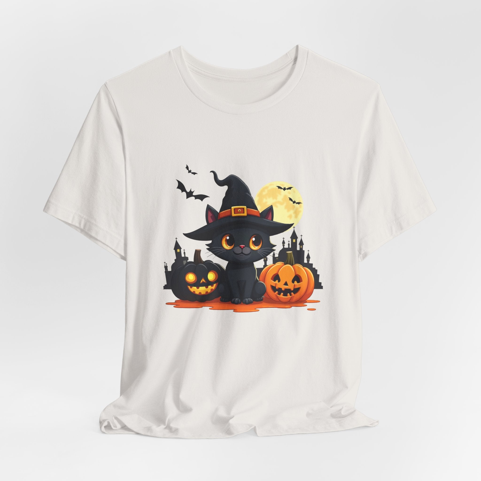 Vintage white t-shirt with a Halloween-themed graphic of a black cat in a witch hat, pumpkins, and bats on a white background.