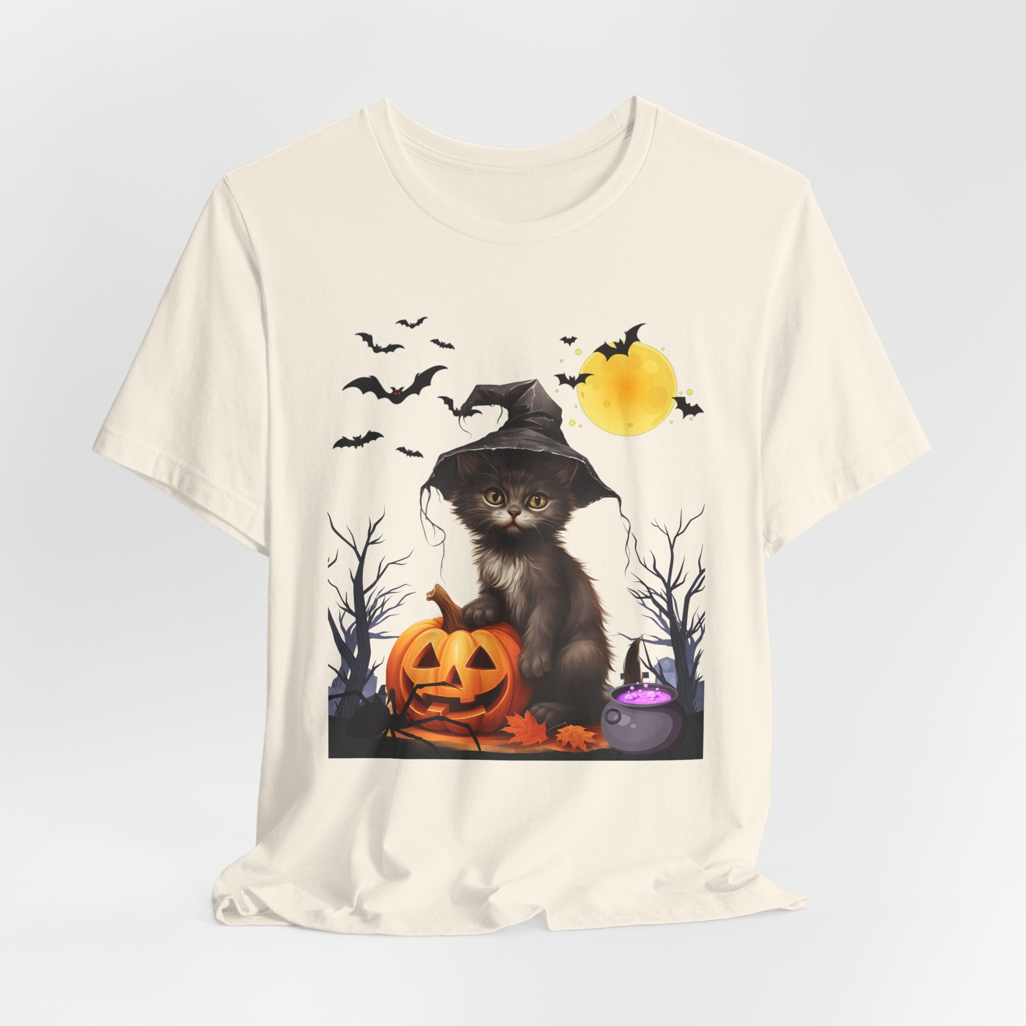 Natural beige t-shirt with a Halloween-themed design featuring a cat in a witch hat and pumpkin.