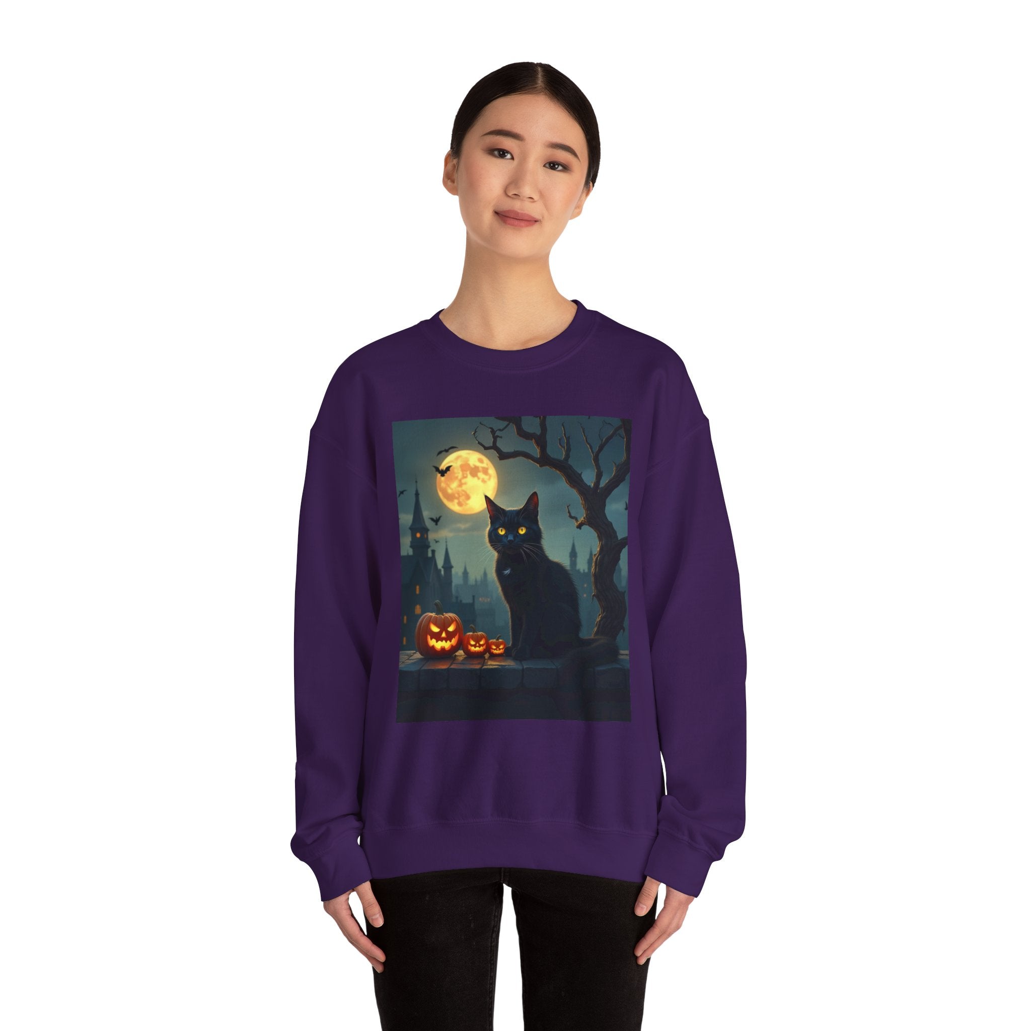 Person wearing a purple Halloween-themed sweatshirt with a black cat and jack-o'-lanterns design.
