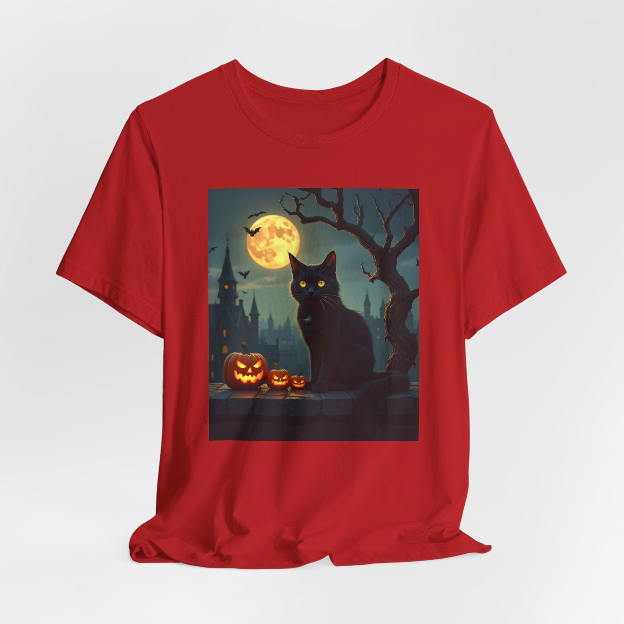 Red t-shirt with a Halloween design featuring a black cat, pumpkins, and a full moon on a white background.