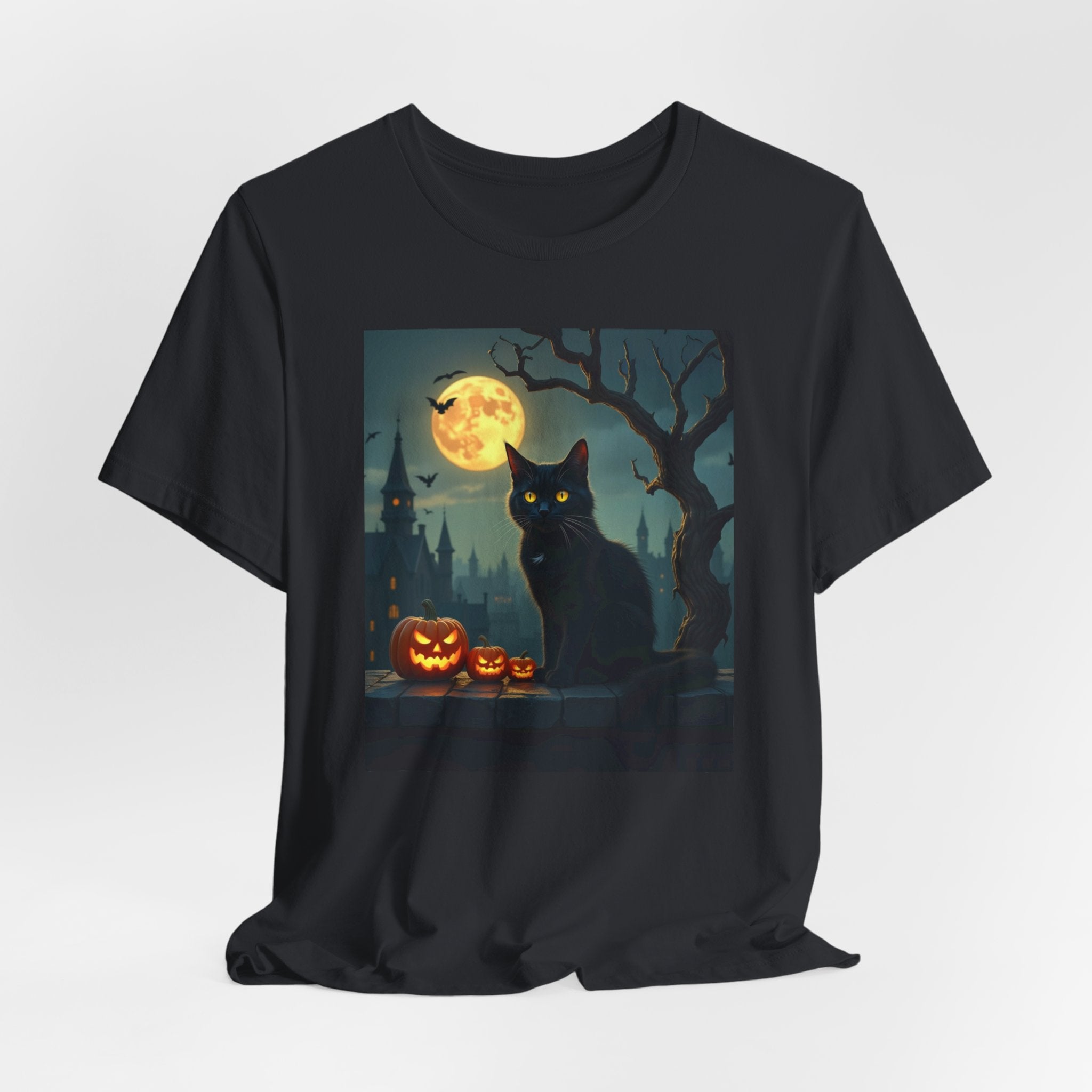 Vintage black t-shirt with a Halloween design featuring a black cat, pumpkins, and a full moon.
