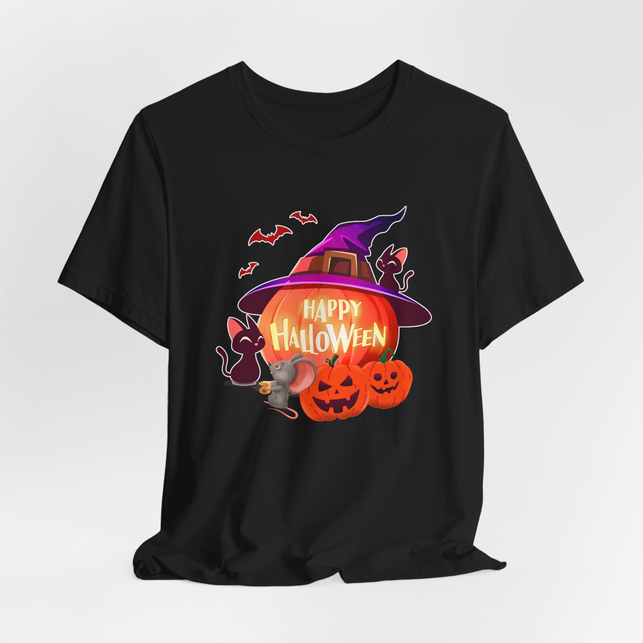 Black t-shirt with Halloween-themed design featuring pumpkins, bats, rodents, and a witch hat on a light gray edge background.