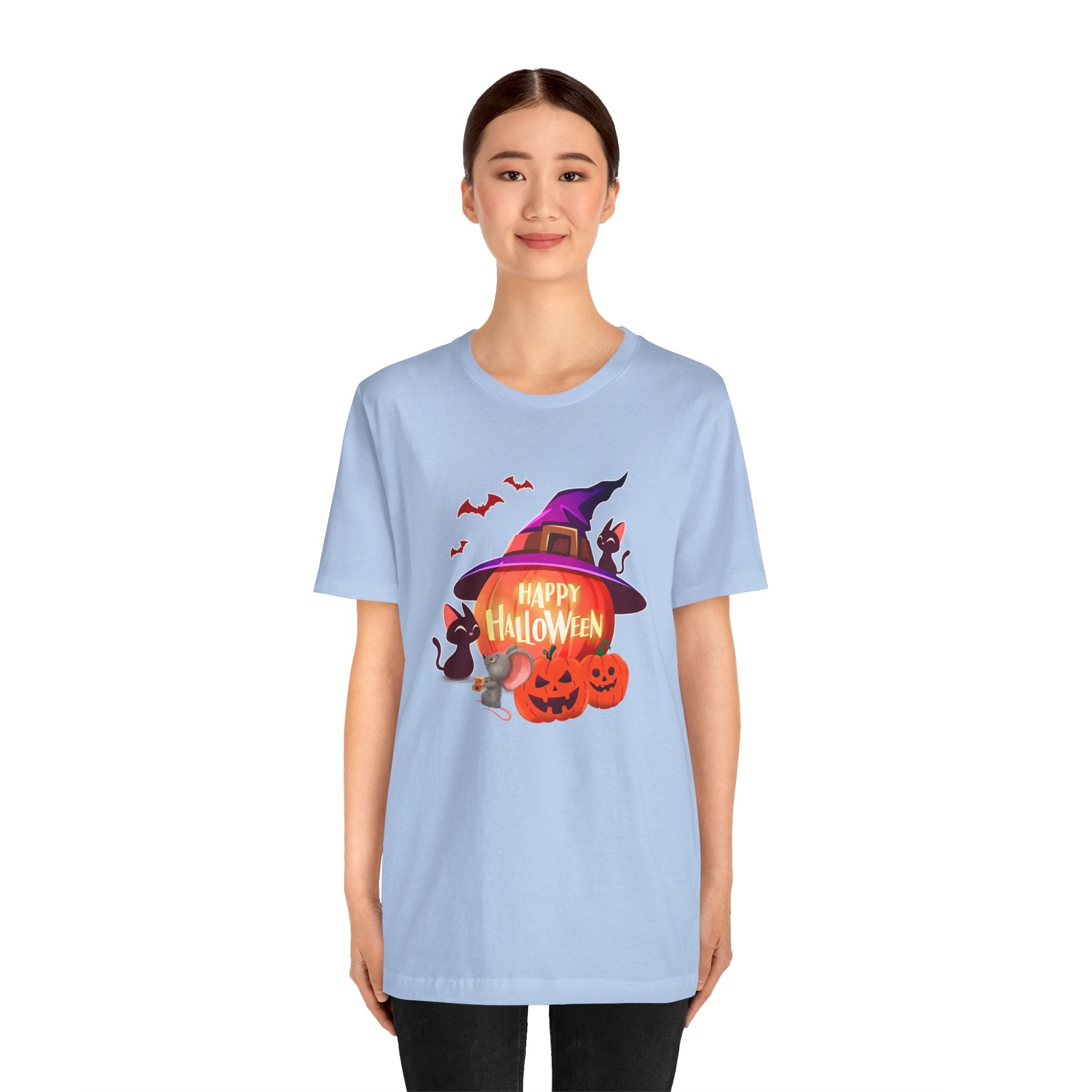 Person wearing a light blue t-shirt with Halloween-themed design on a white background