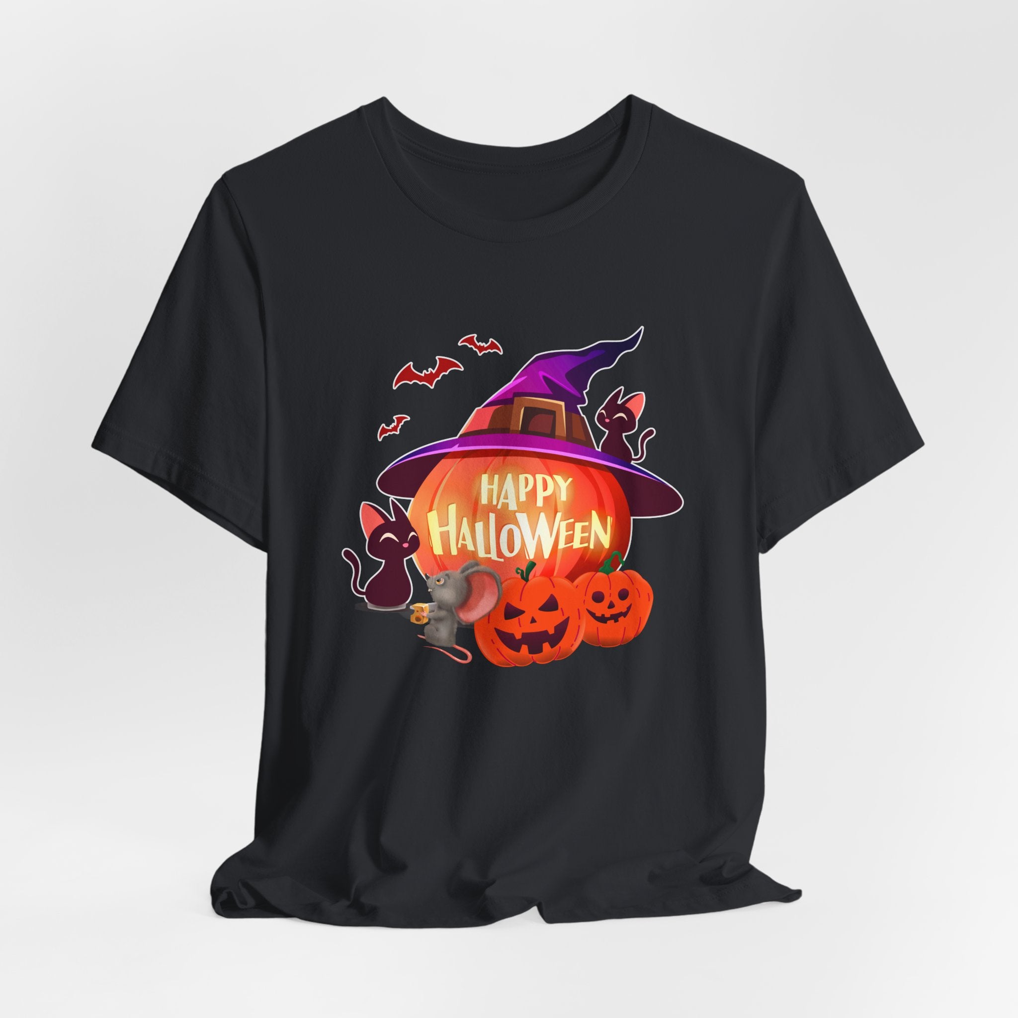 Vintage black t-shirt with Halloween-themed design featuring pumpkins, a witch hat, and text on a white background.