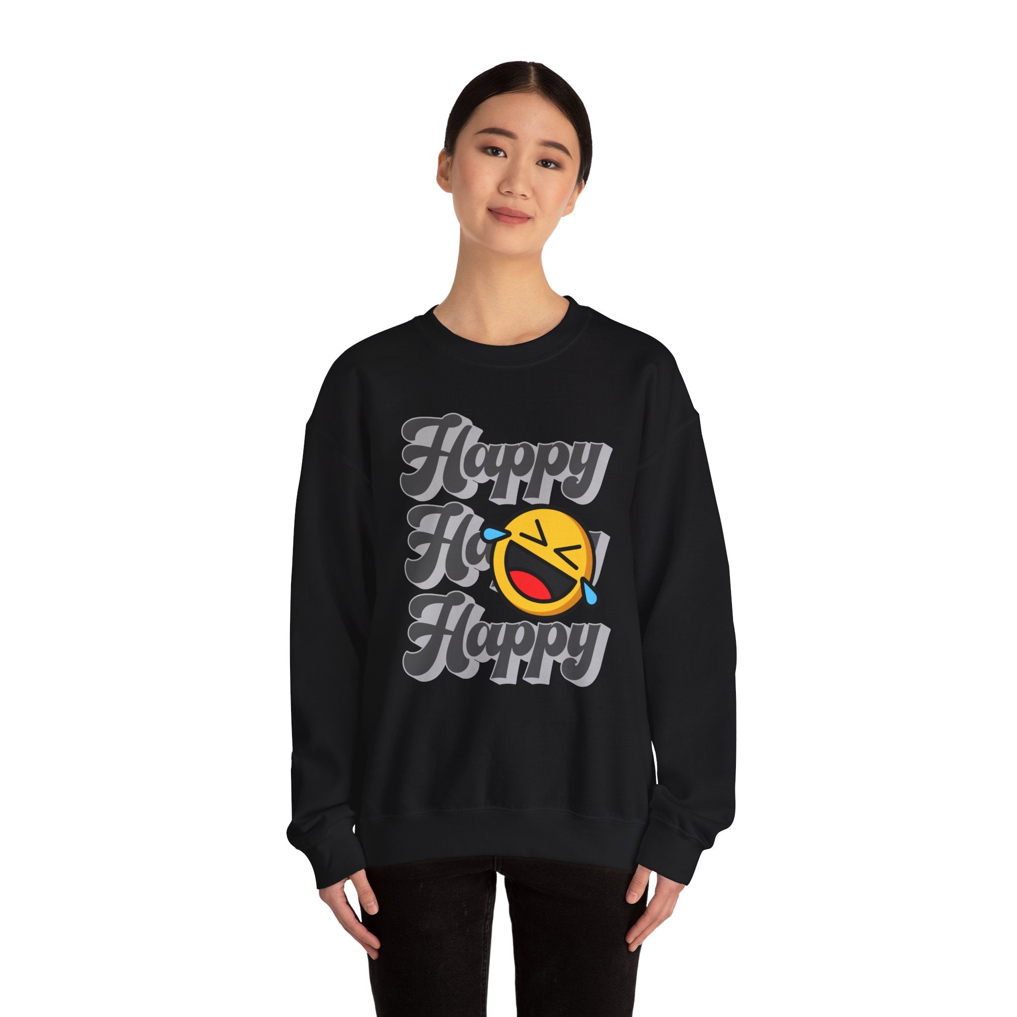 Person wearing a black sweatshirt with 'Happy Ho Happy' text and emoji design on a white background