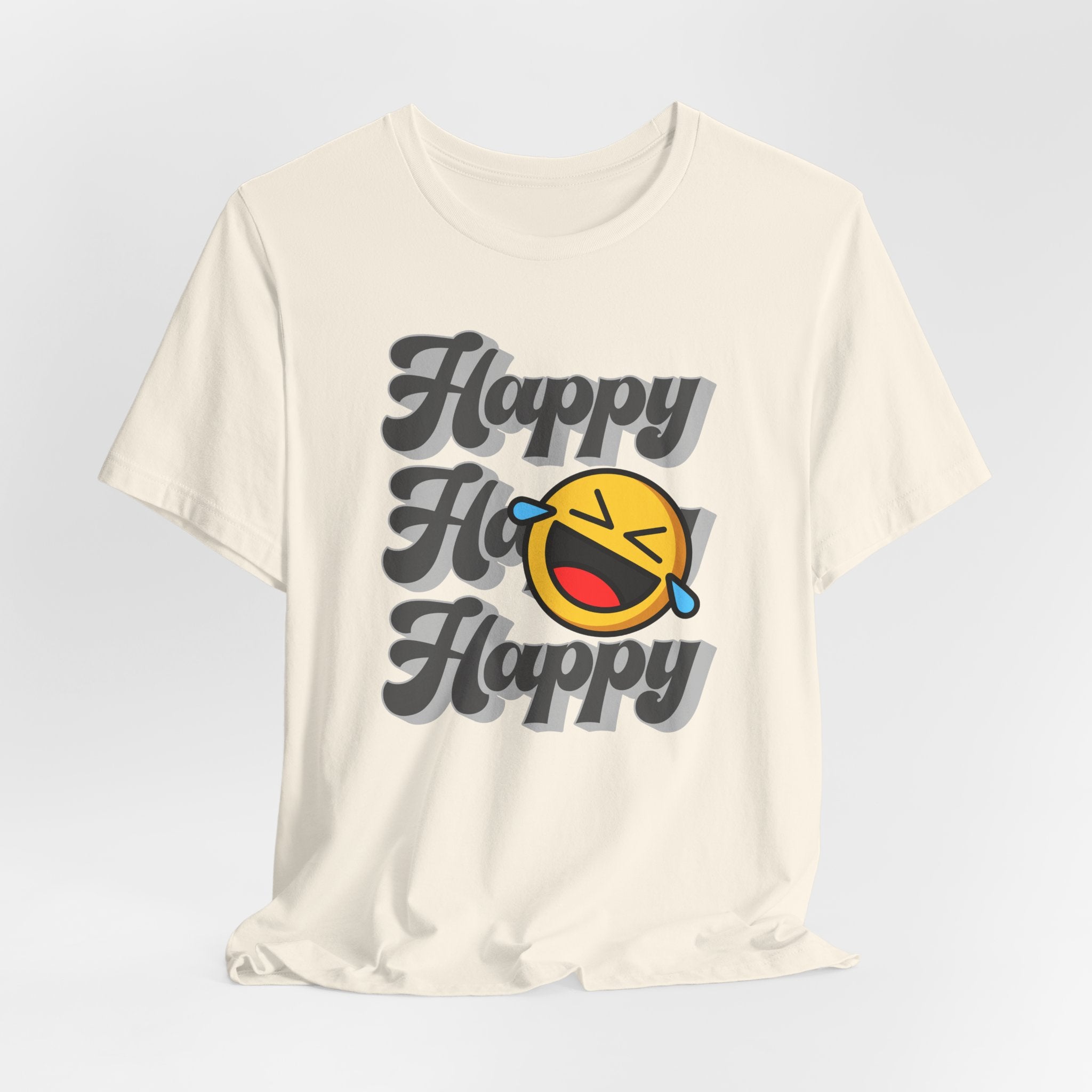 Beige t-shirt with 'Happy Ho Happy' text and emoji on a light gray background