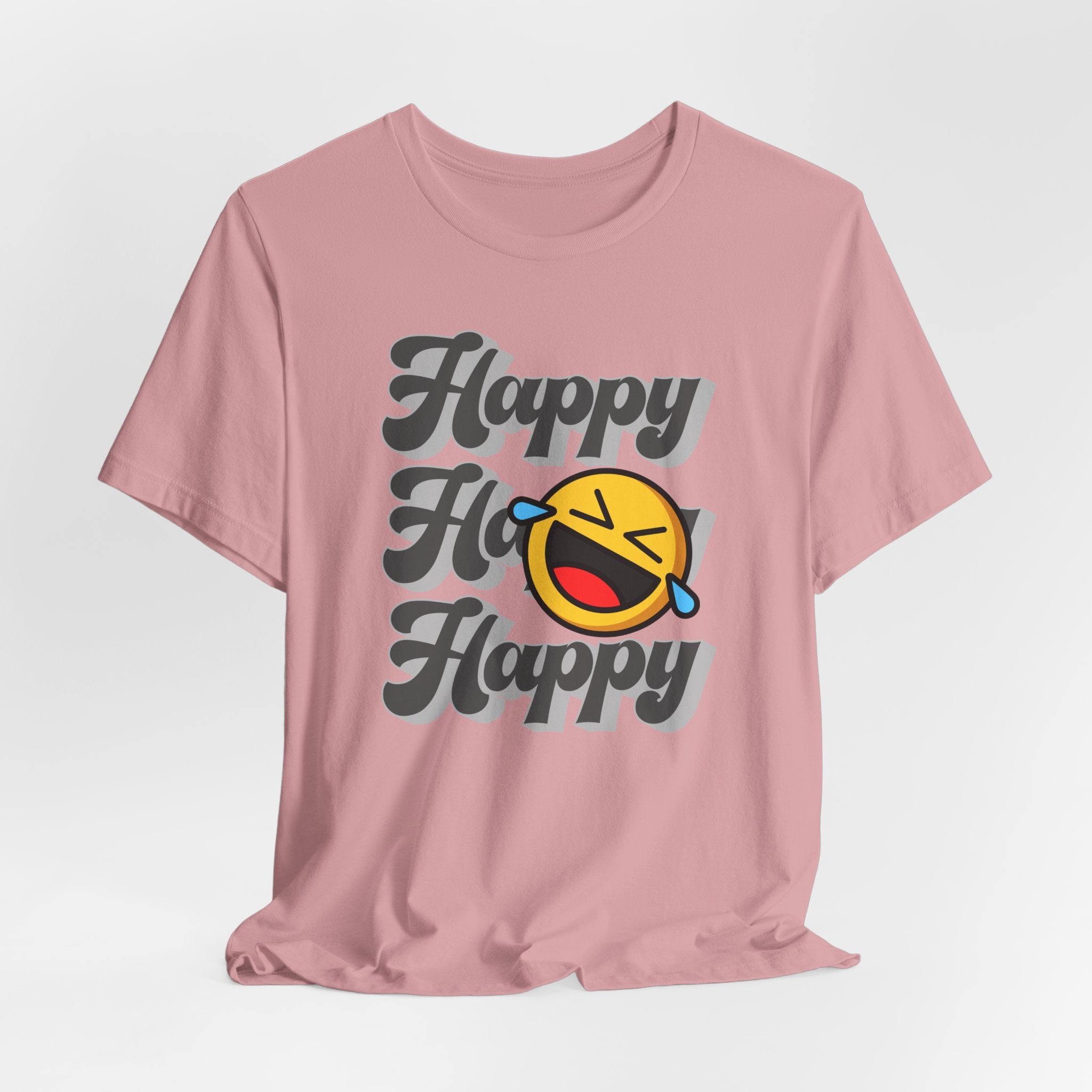 Pink t-shirt with 'Happy Ho Happy' text and emoji on a light gray background