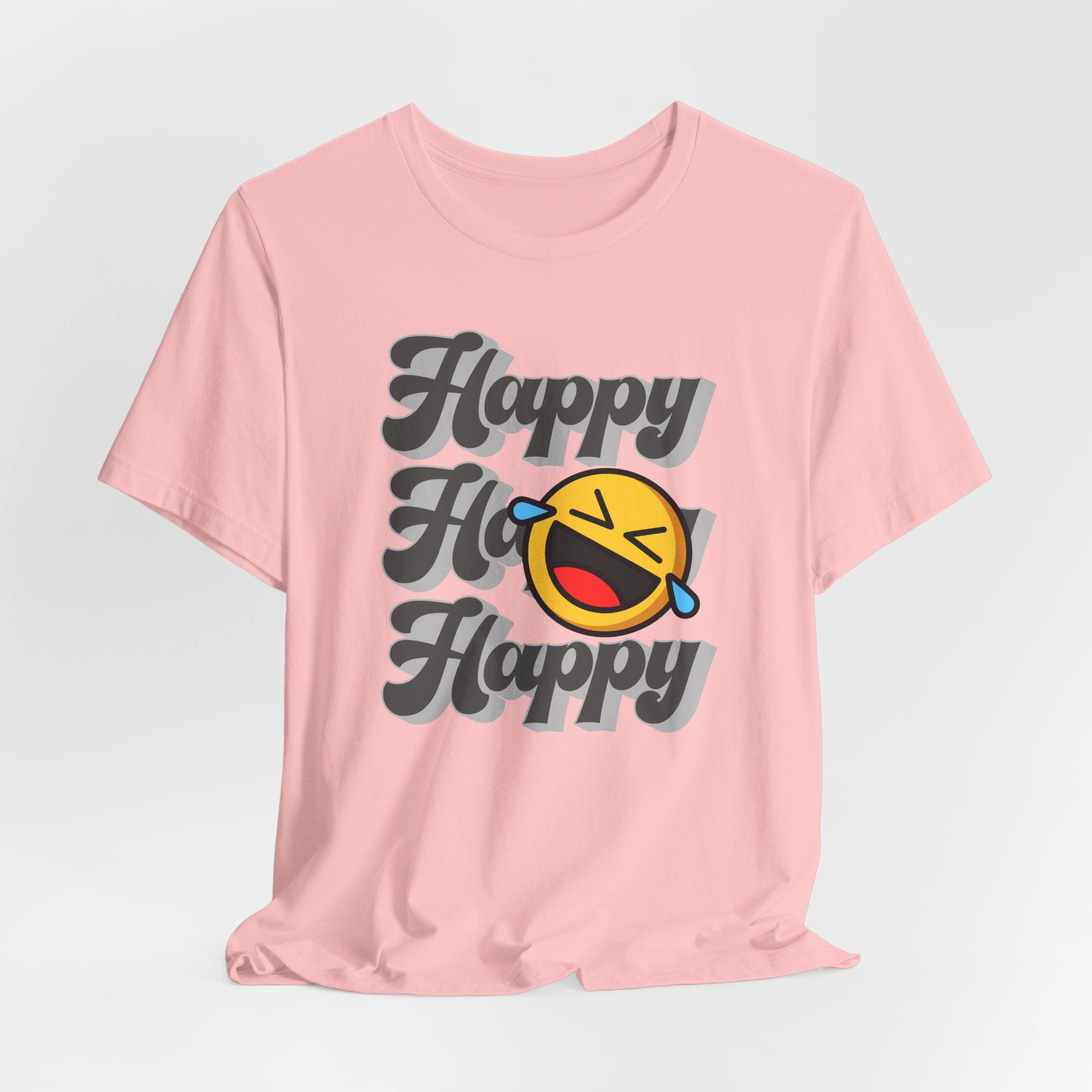 Pink t-shirt with 'Happy Ho Happy' text and emoji on a light gray background