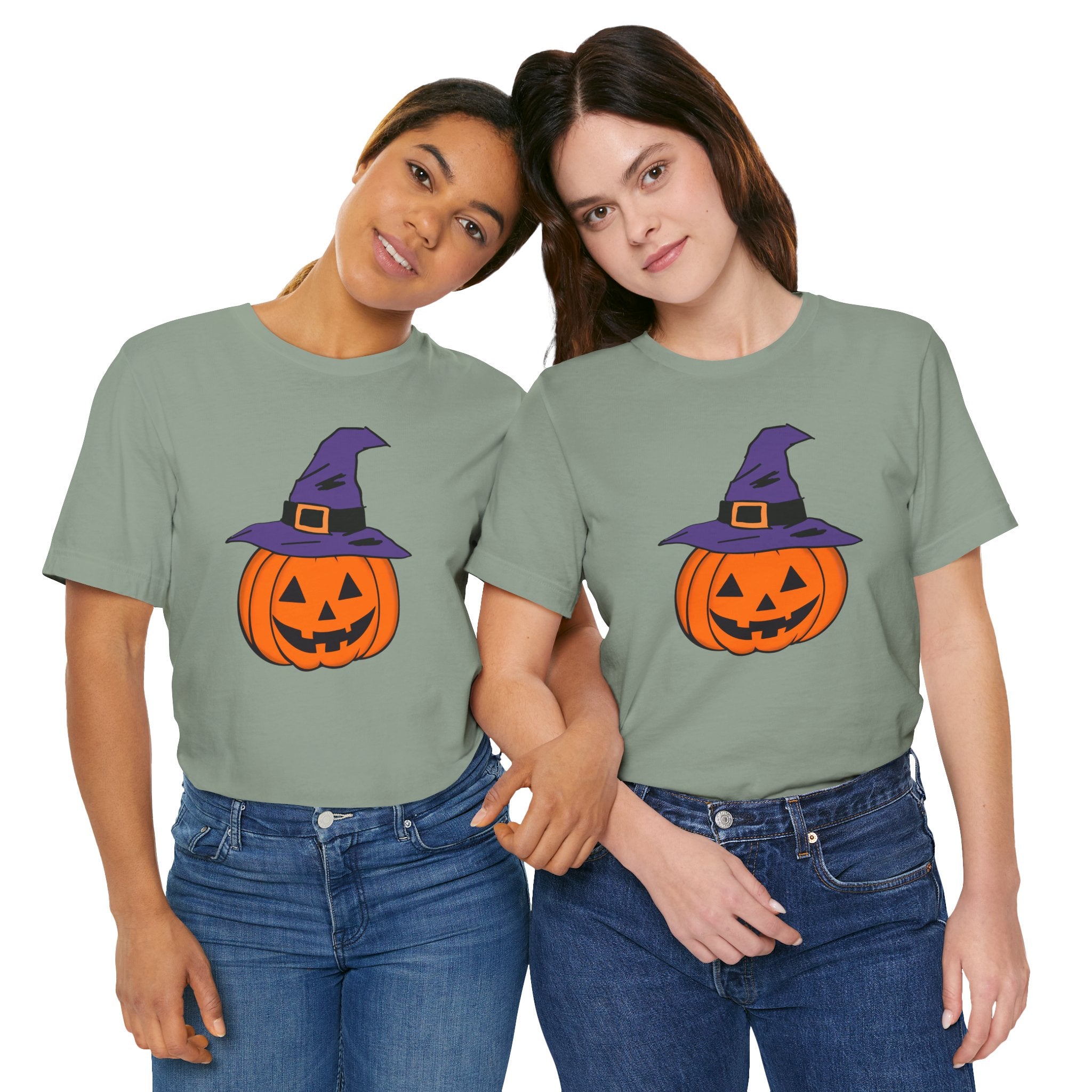Two people wearing matching Halloween-themed t-shirts with pumpkin designs on a white background