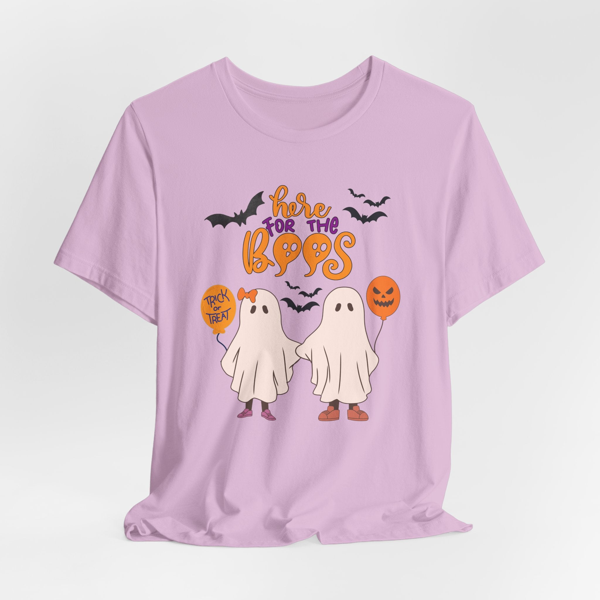 Lilac purple t-shirt with Halloween-themed graphics and text on a light gray background