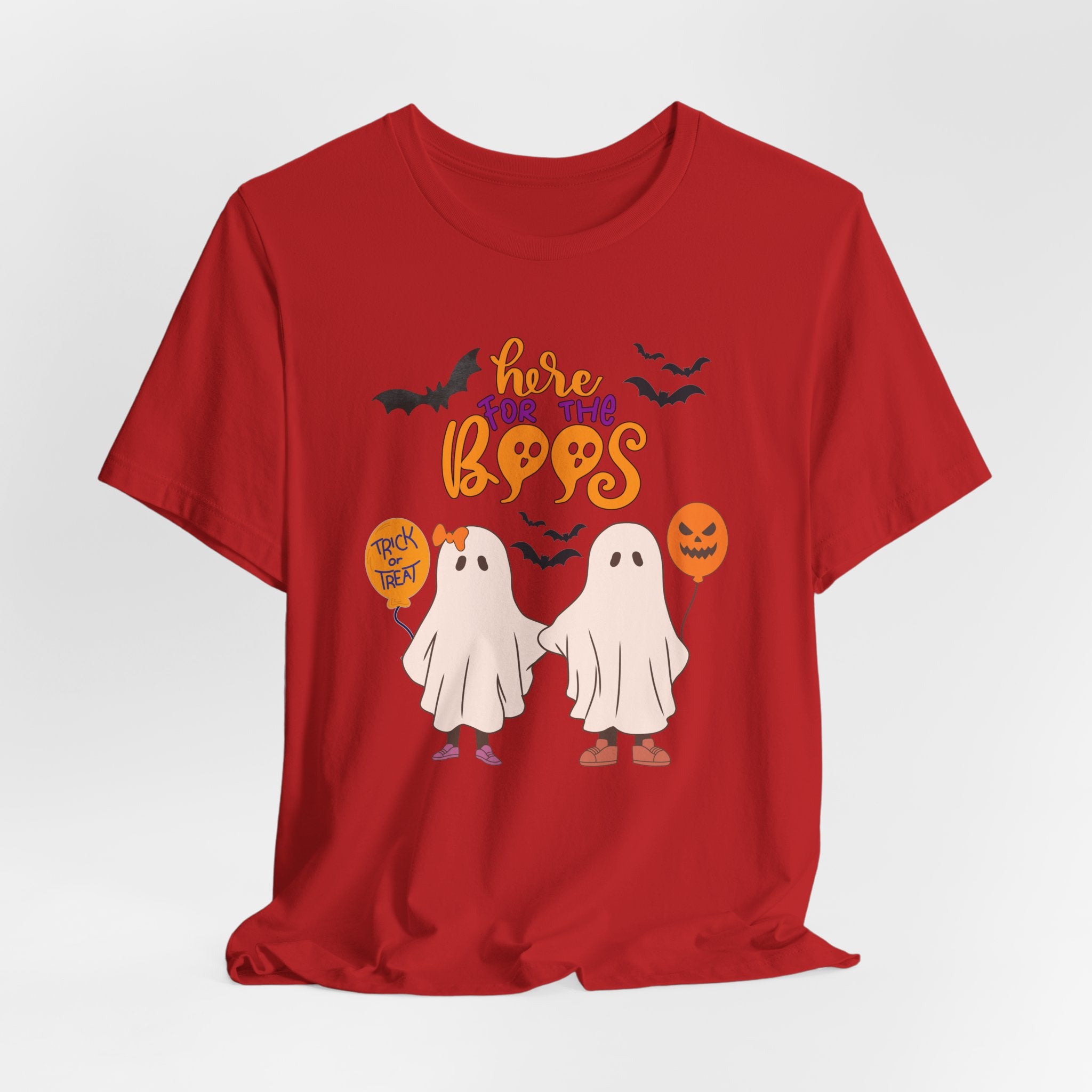 Red t-shirt with Halloween-themed design featuring ghosts and text on a white background